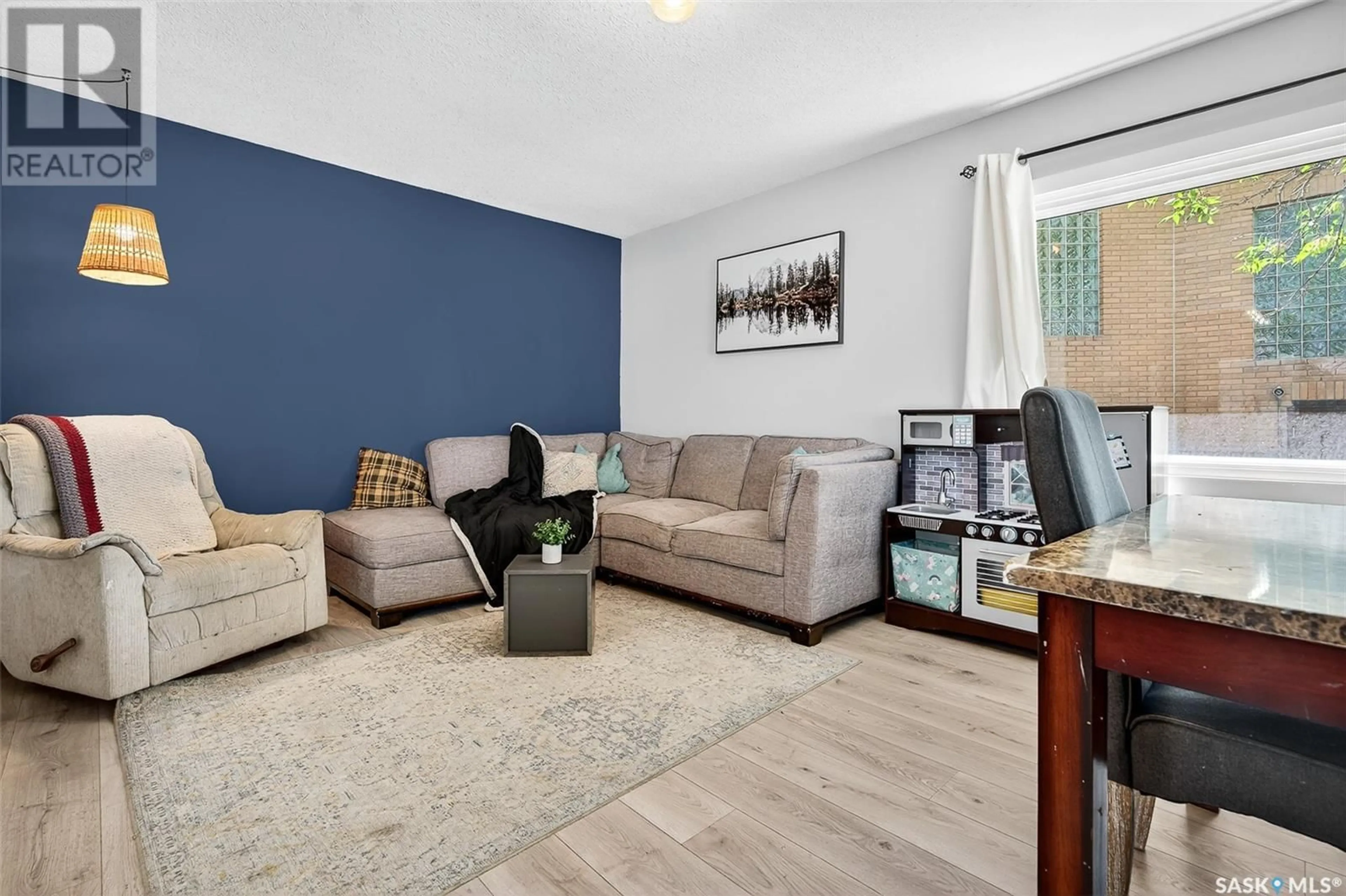 Living room with furniture, unknown for 657 GRANDVIEW STREET, Moose Jaw Saskatchewan S6H5L3