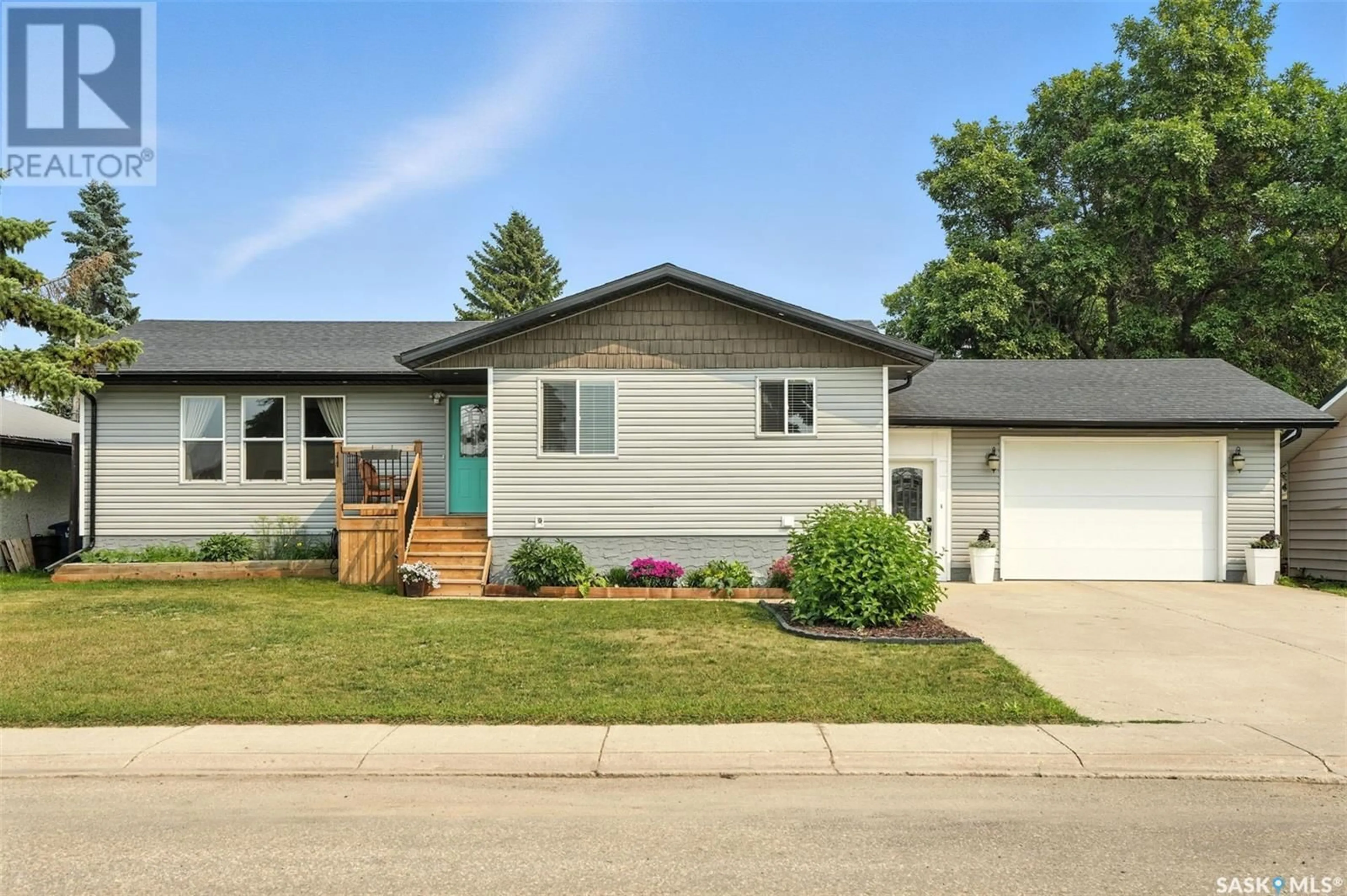 Home with vinyl exterior material, street for 213 3RD AVENUE, Rosthern Saskatchewan S0K3R0