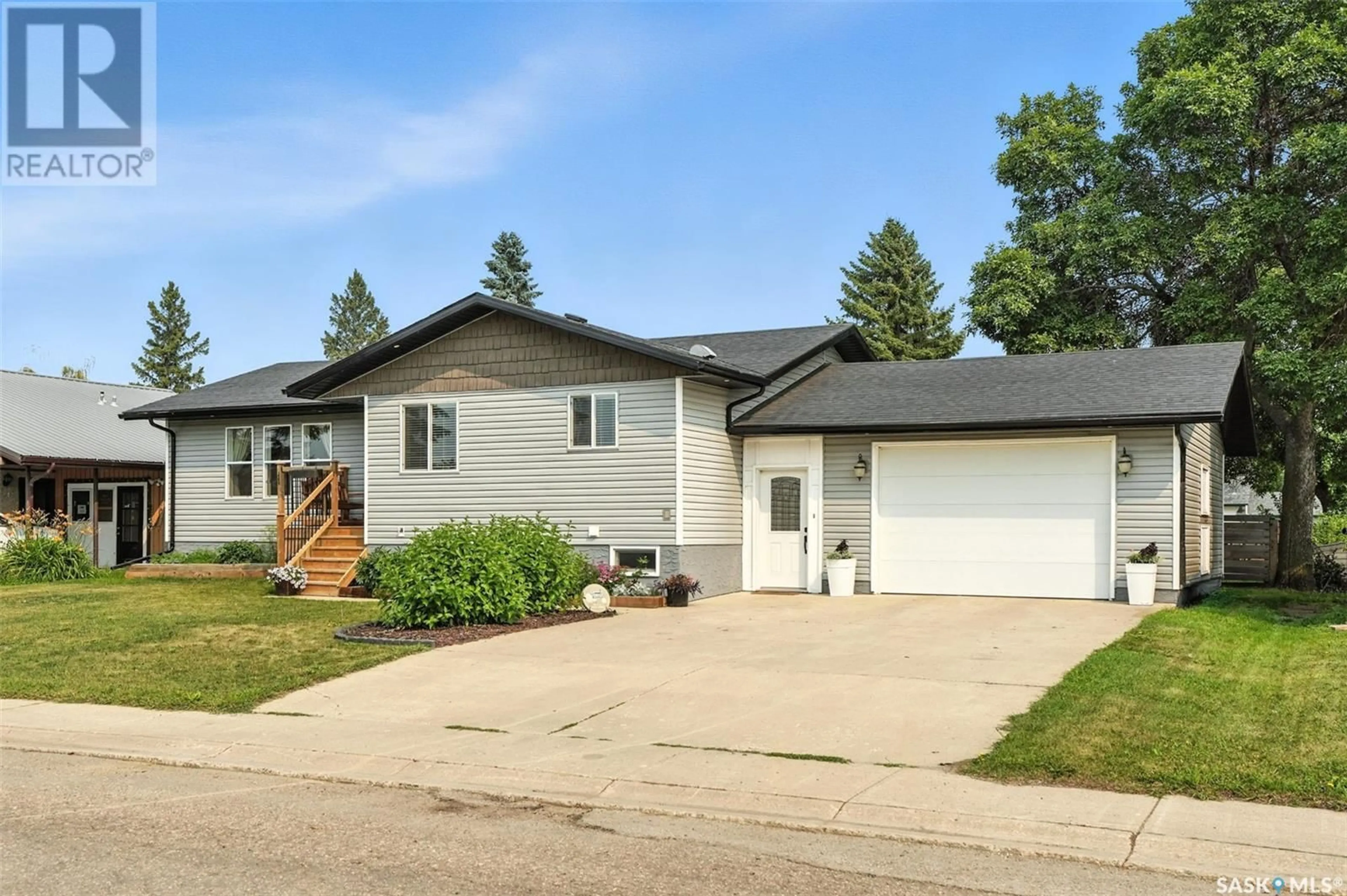 Home with vinyl exterior material, street for 213 3RD AVENUE, Rosthern Saskatchewan S0K3R0