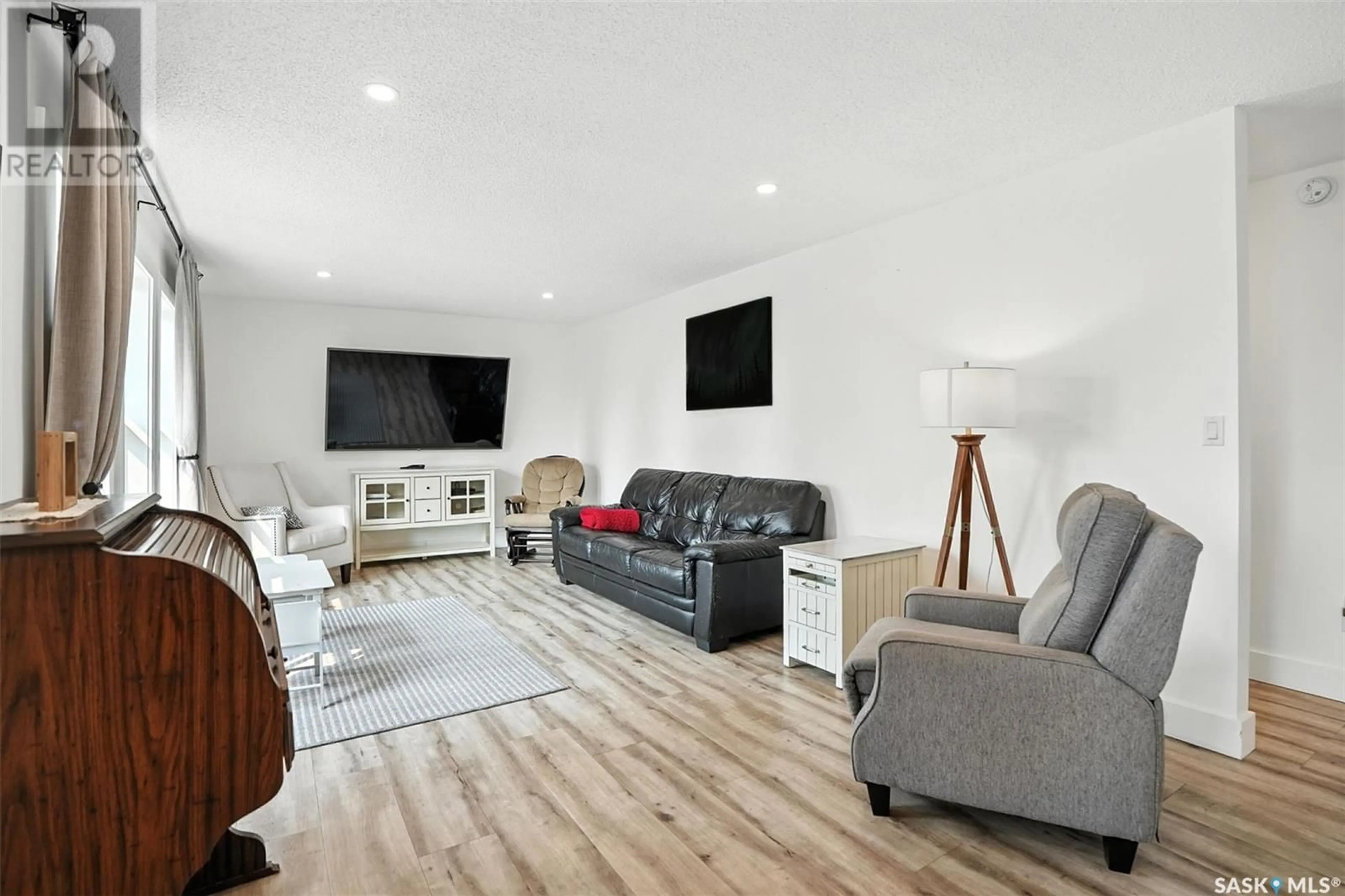 Living room with furniture, unknown for 213 3RD AVENUE, Rosthern Saskatchewan S0K3R0