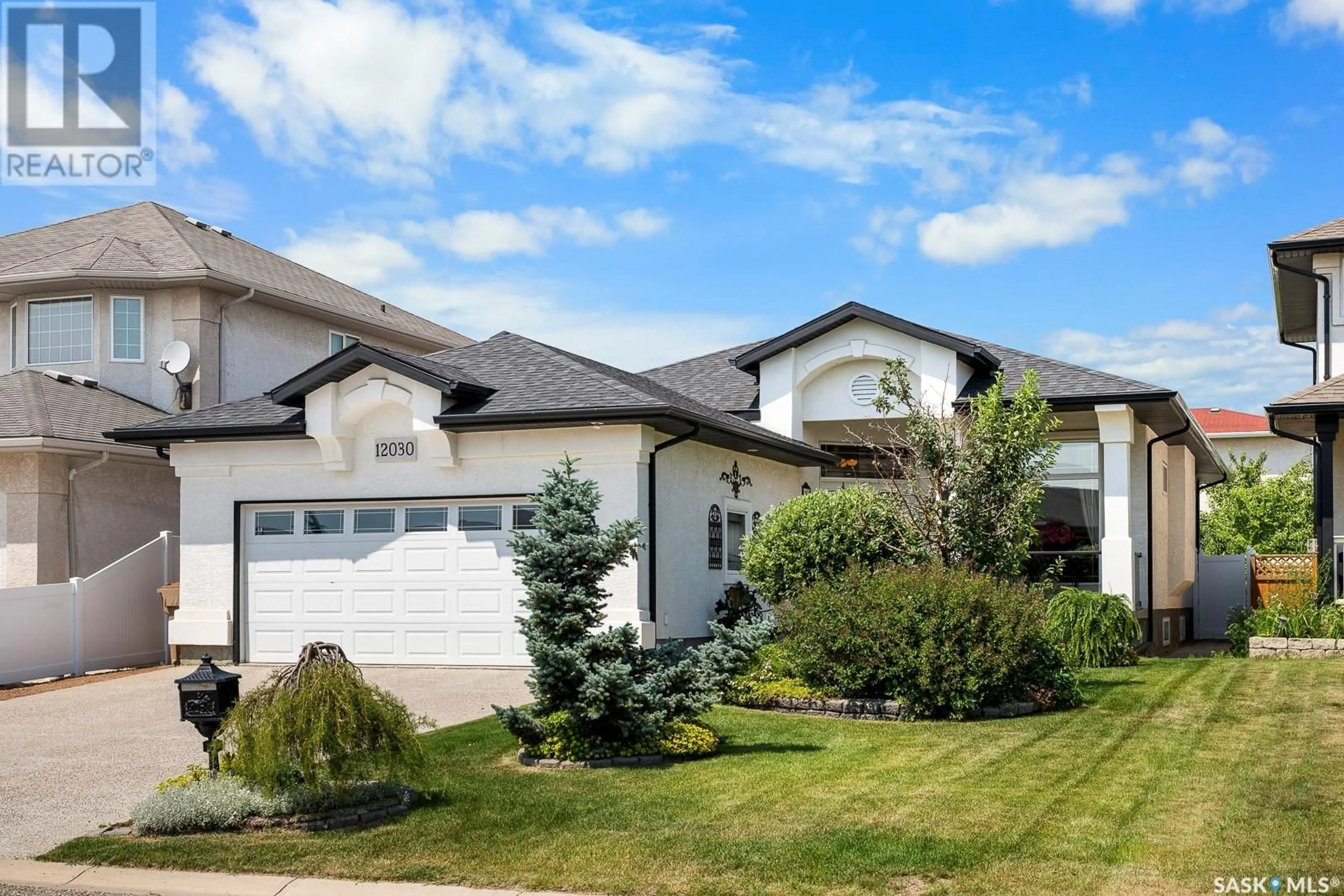 Home with vinyl exterior material, street for 12030 WASCANA HEIGHTS, Regina Saskatchewan S4V3E2