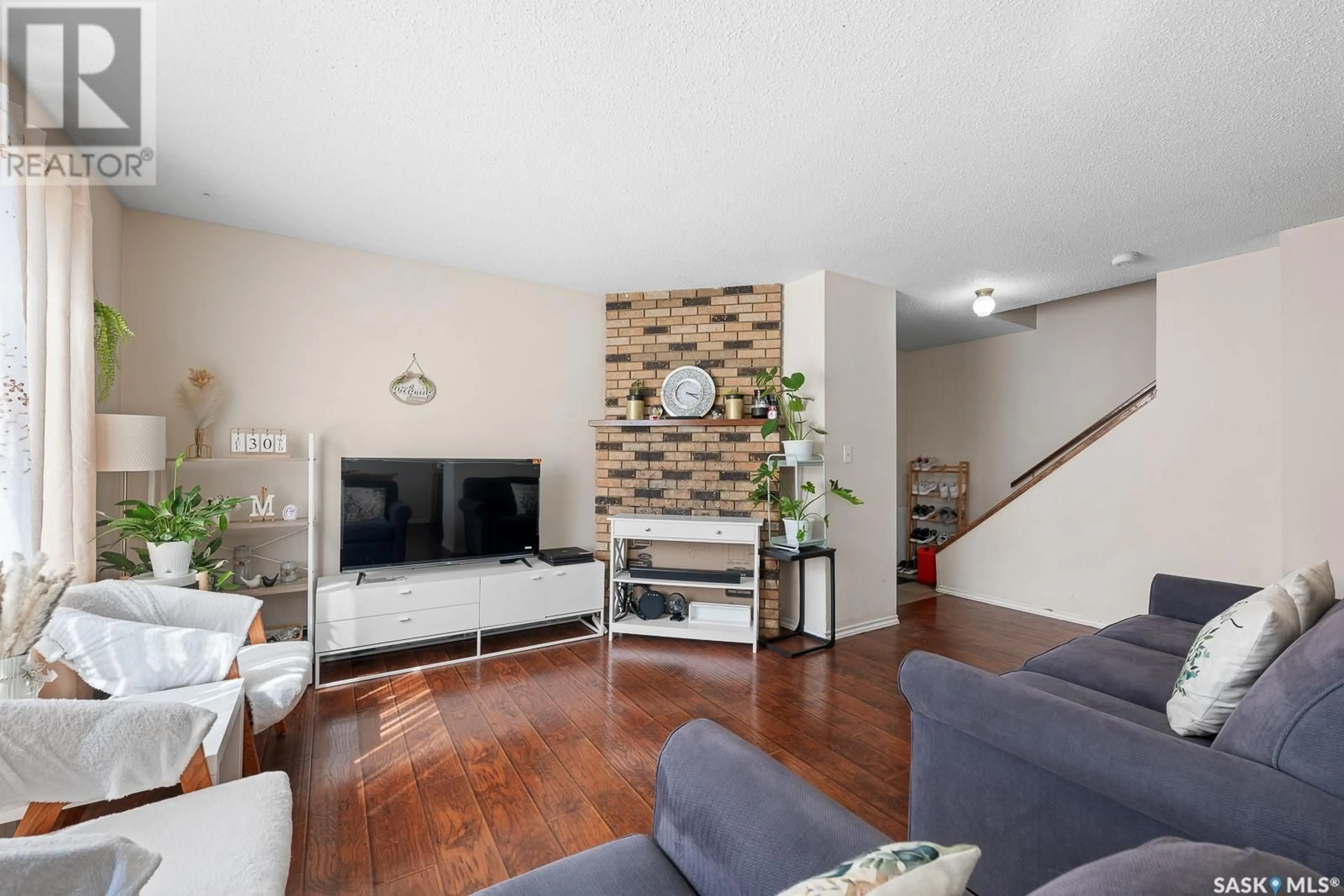 Living room with furniture, unknown for 940 MCINTOSH STREET, Regina Saskatchewan S4T5B4