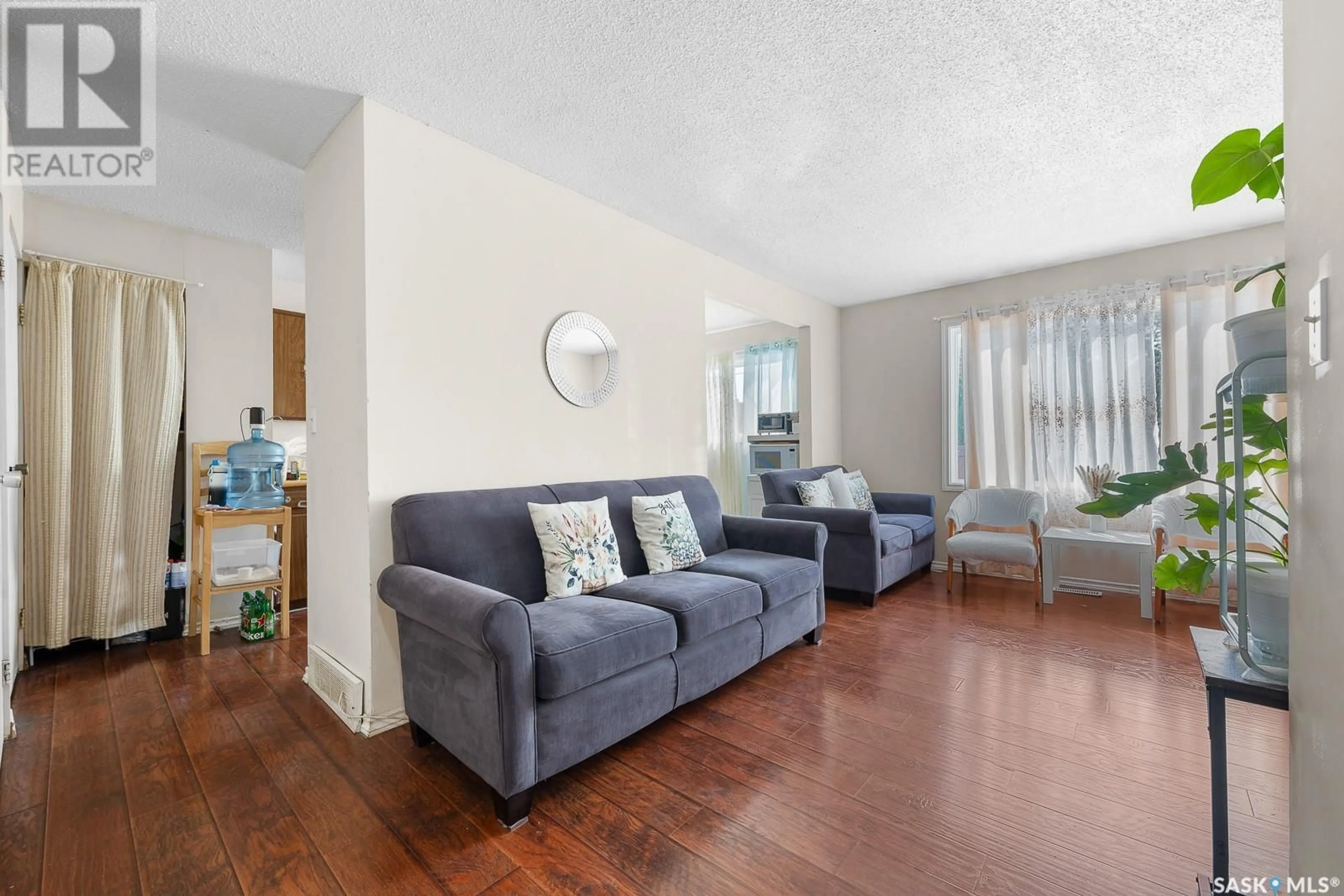Living room with furniture, unknown for 940 MCINTOSH STREET, Regina Saskatchewan S4T5B4