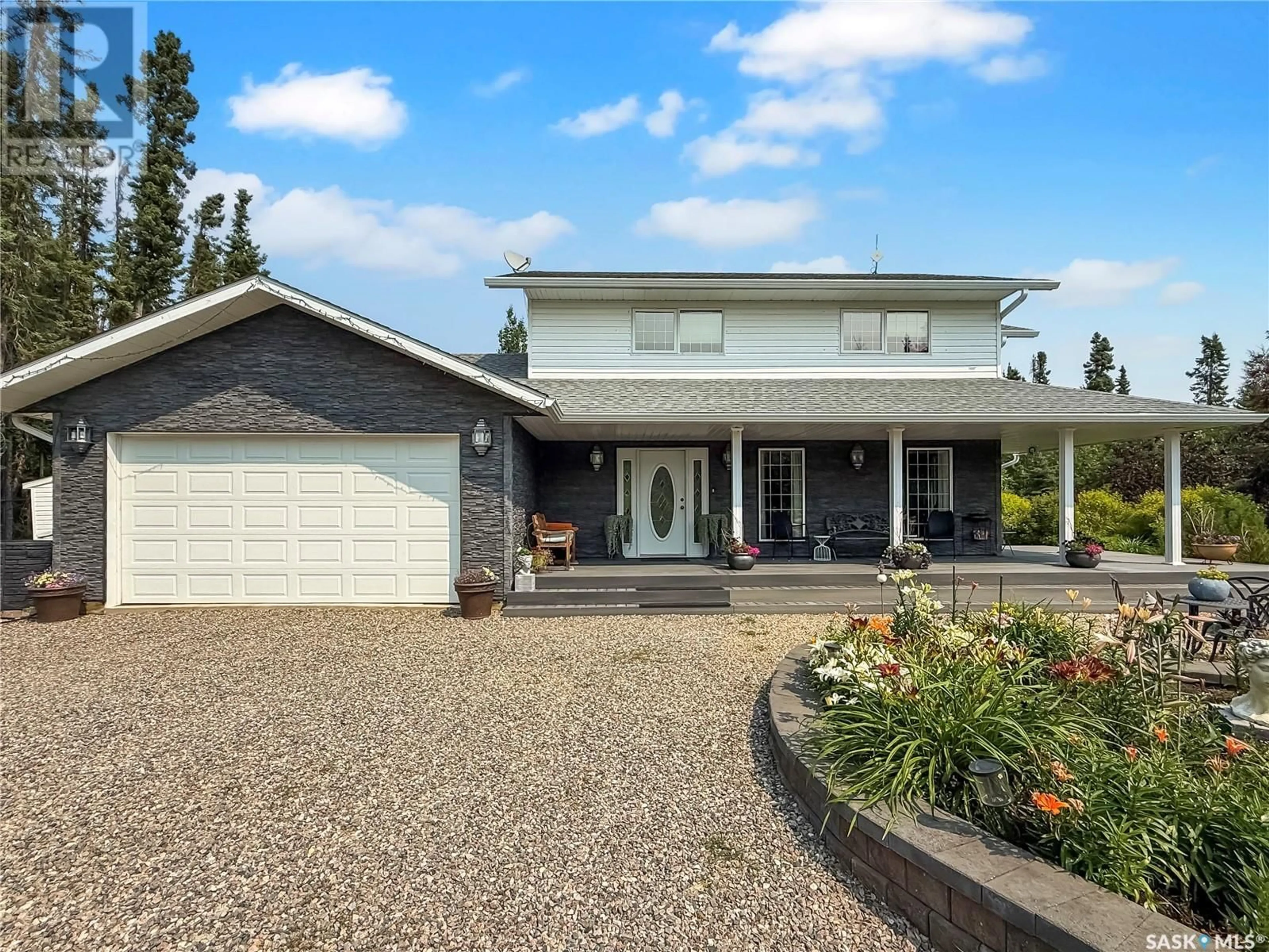 Home with vinyl exterior material, street for 5 POPLAR PLACE, Candle Lake Saskatchewan S0J3E0