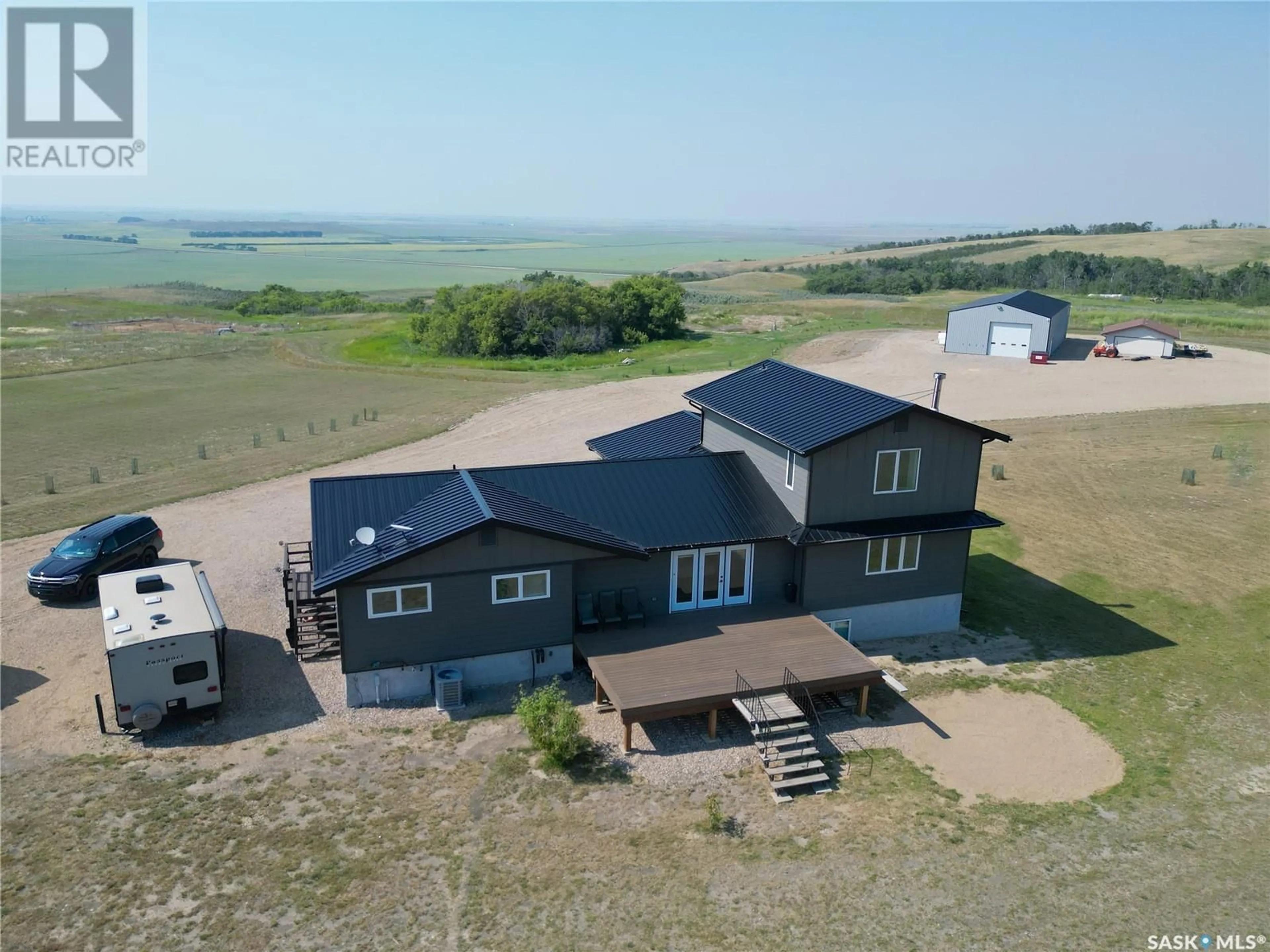 A pic from outside/outdoor area/front of a property/back of a property/a pic from drone, building for Edwards ACREAGE, Last Mountain Valley RM No. 250 Saskatchewan S0G4V0