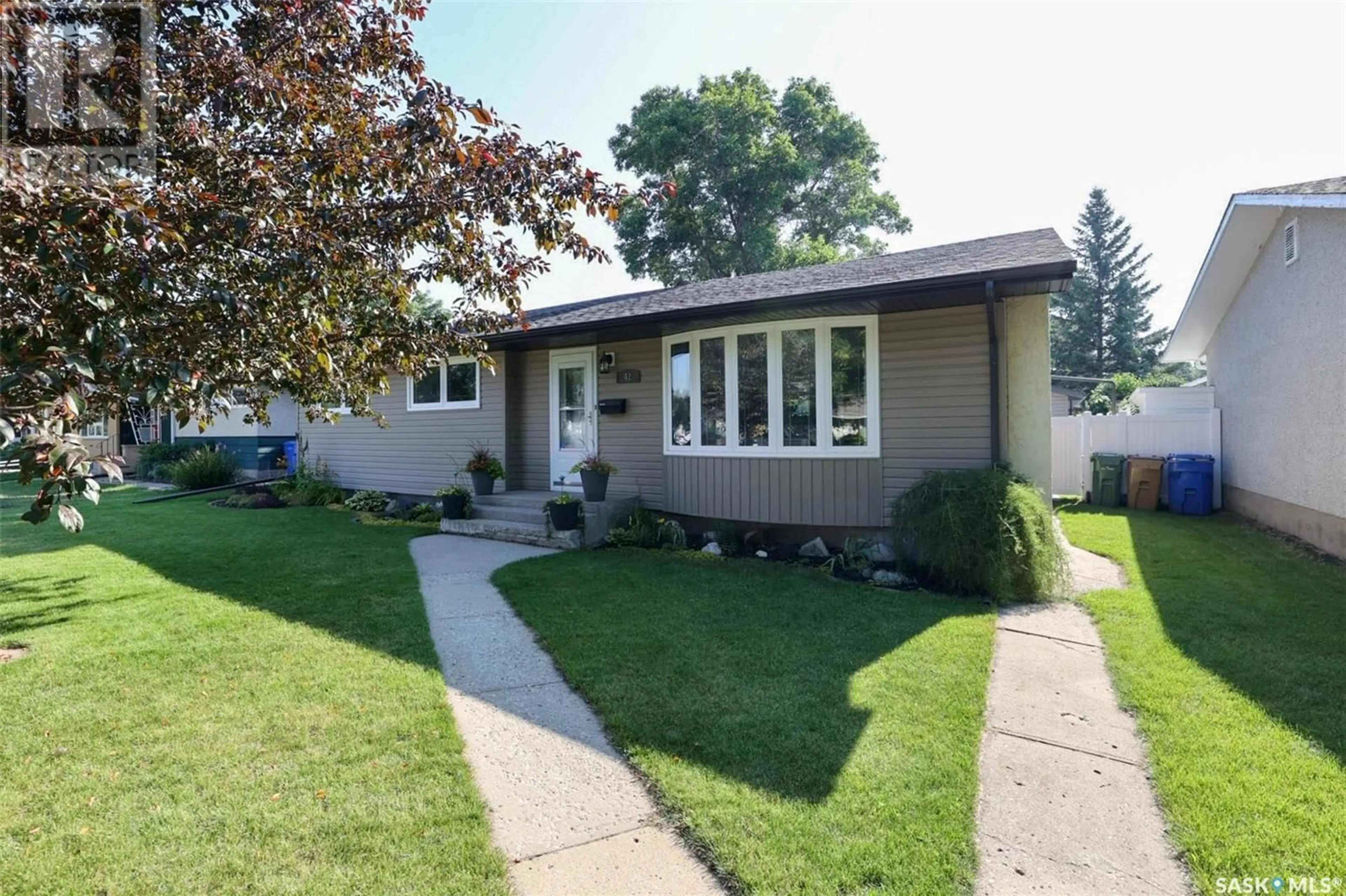 Home with vinyl exterior material, street for 42 HANLEY CRESCENT, Regina Saskatchewan S4R5A7