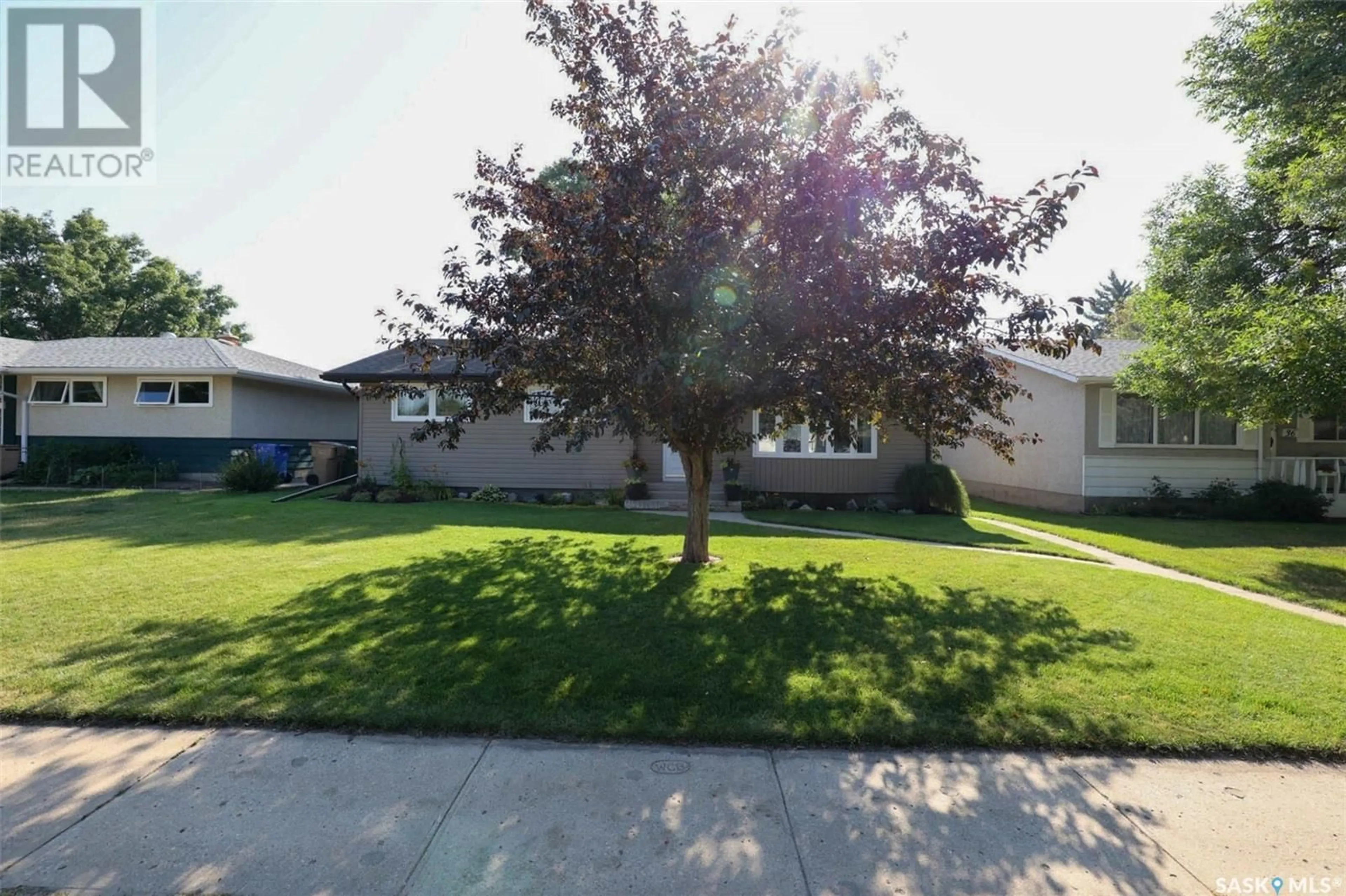 Home with vinyl exterior material, street for 42 HANLEY CRESCENT, Regina Saskatchewan S4R5A7