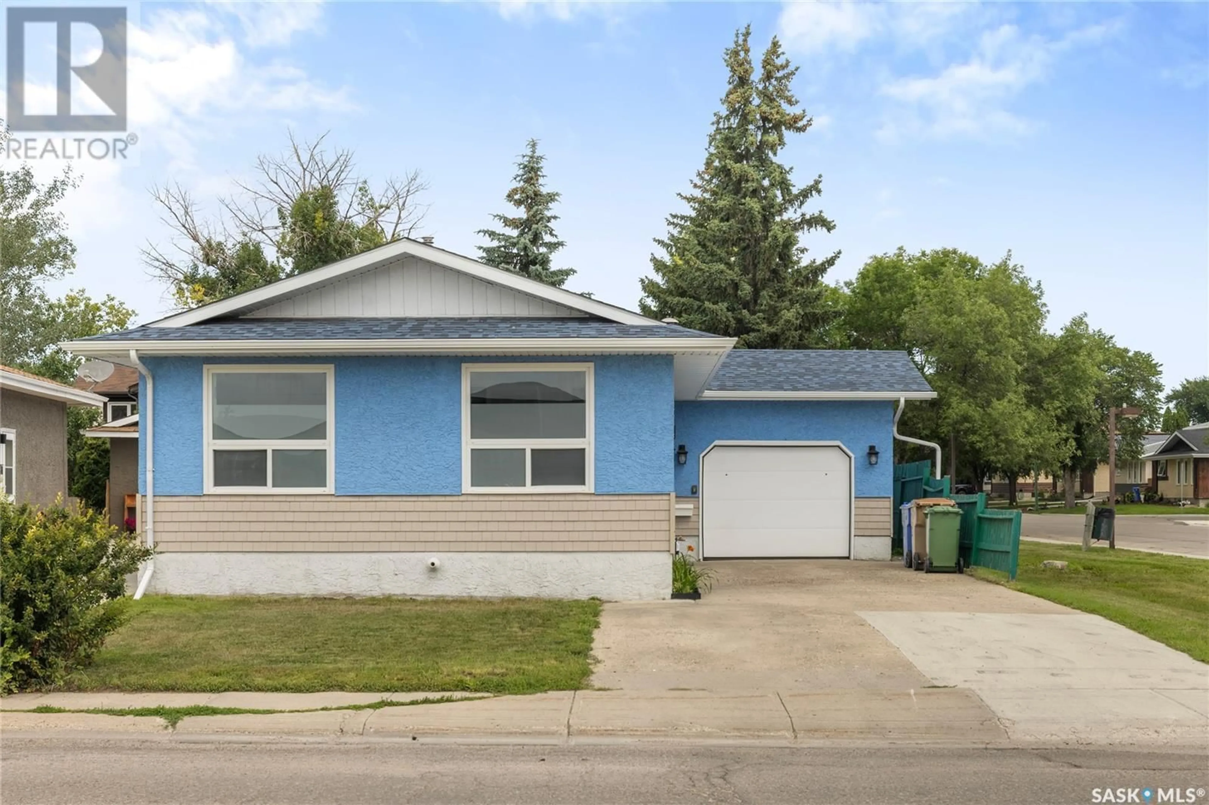 Home with vinyl exterior material, street for 6906 DALGLIESH DRIVE, Regina Saskatchewan S4X2M6