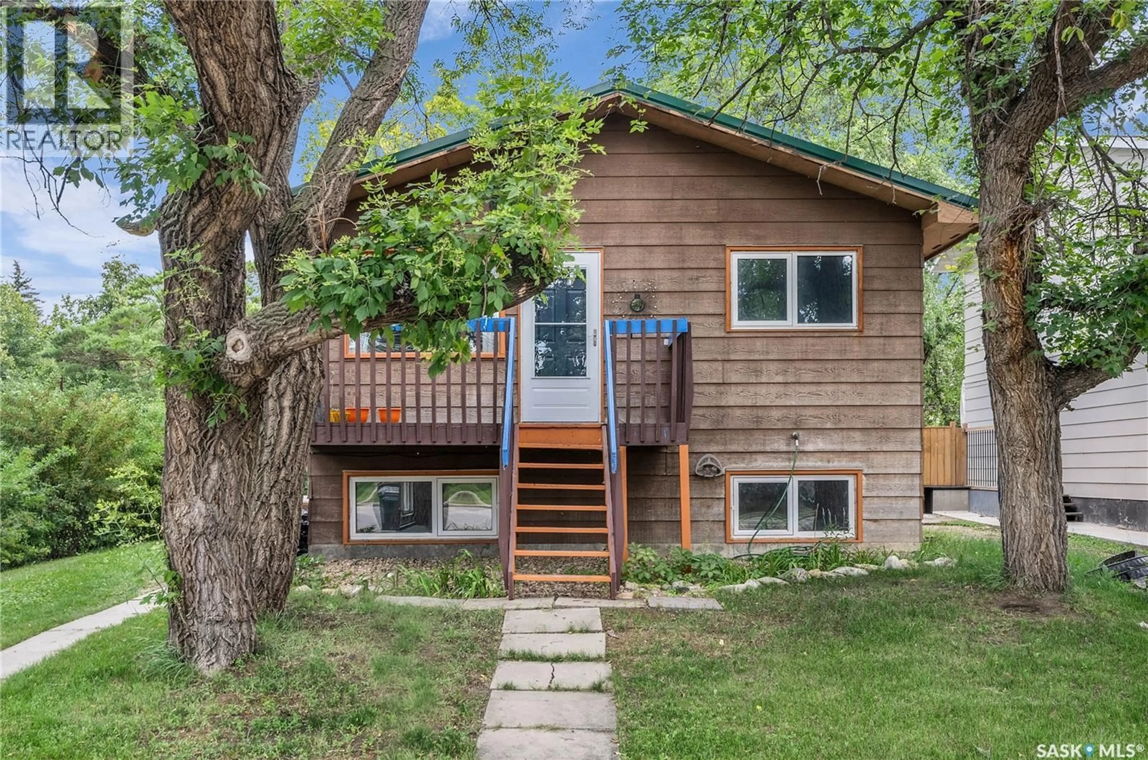 Home with vinyl exterior material, street for 1613 CENTRAL AVENUE, Saskatoon Saskatchewan S7N2T4