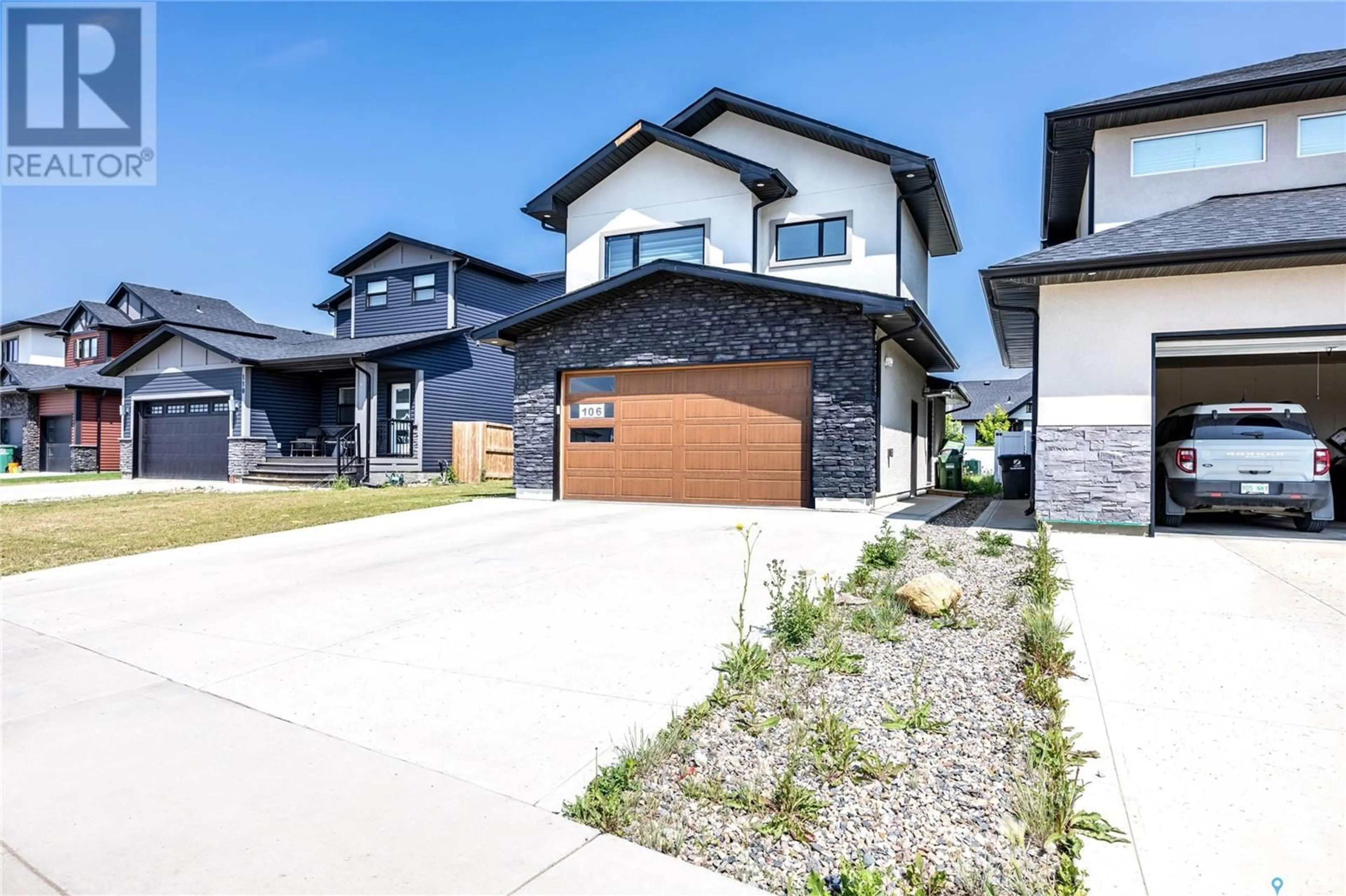 Home with brick exterior material, street for 106 KENASCHUK CRESCENT, Saskatoon Saskatchewan S7W0Y6
