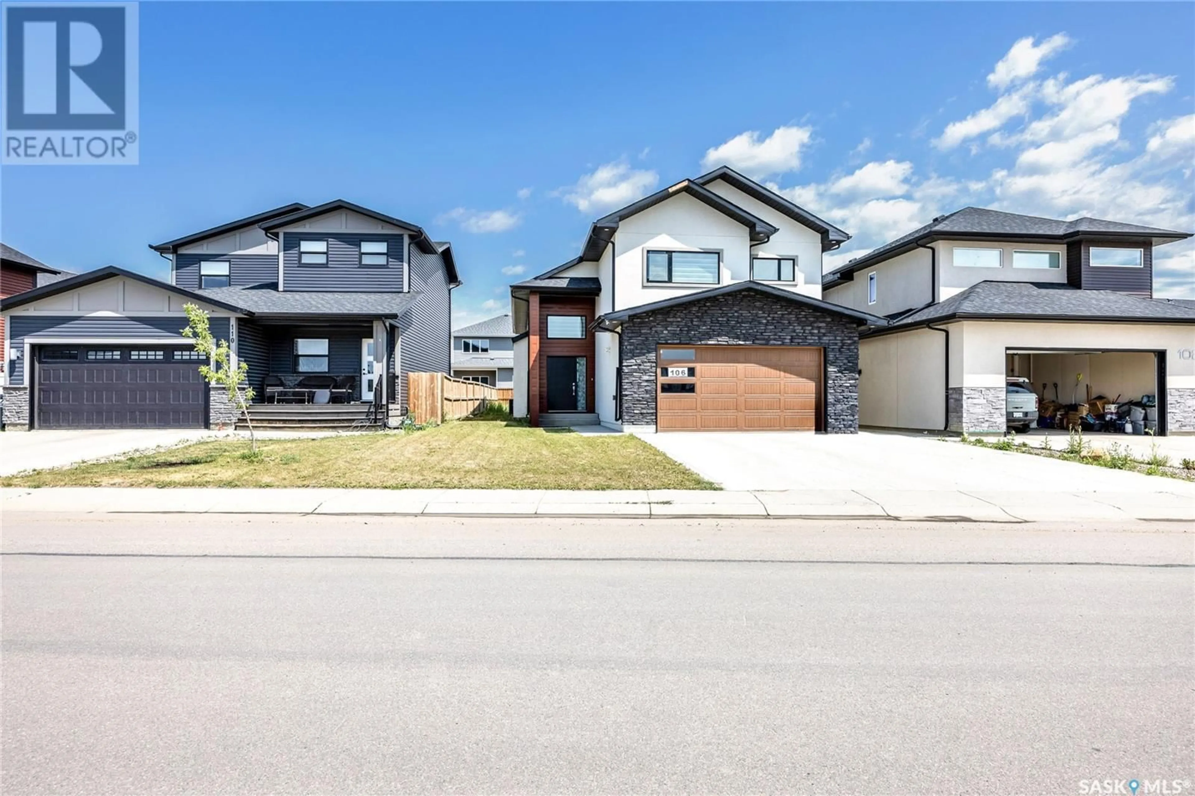 Home with brick exterior material, street for 106 KENASCHUK CRESCENT, Saskatoon Saskatchewan S7W0Y6
