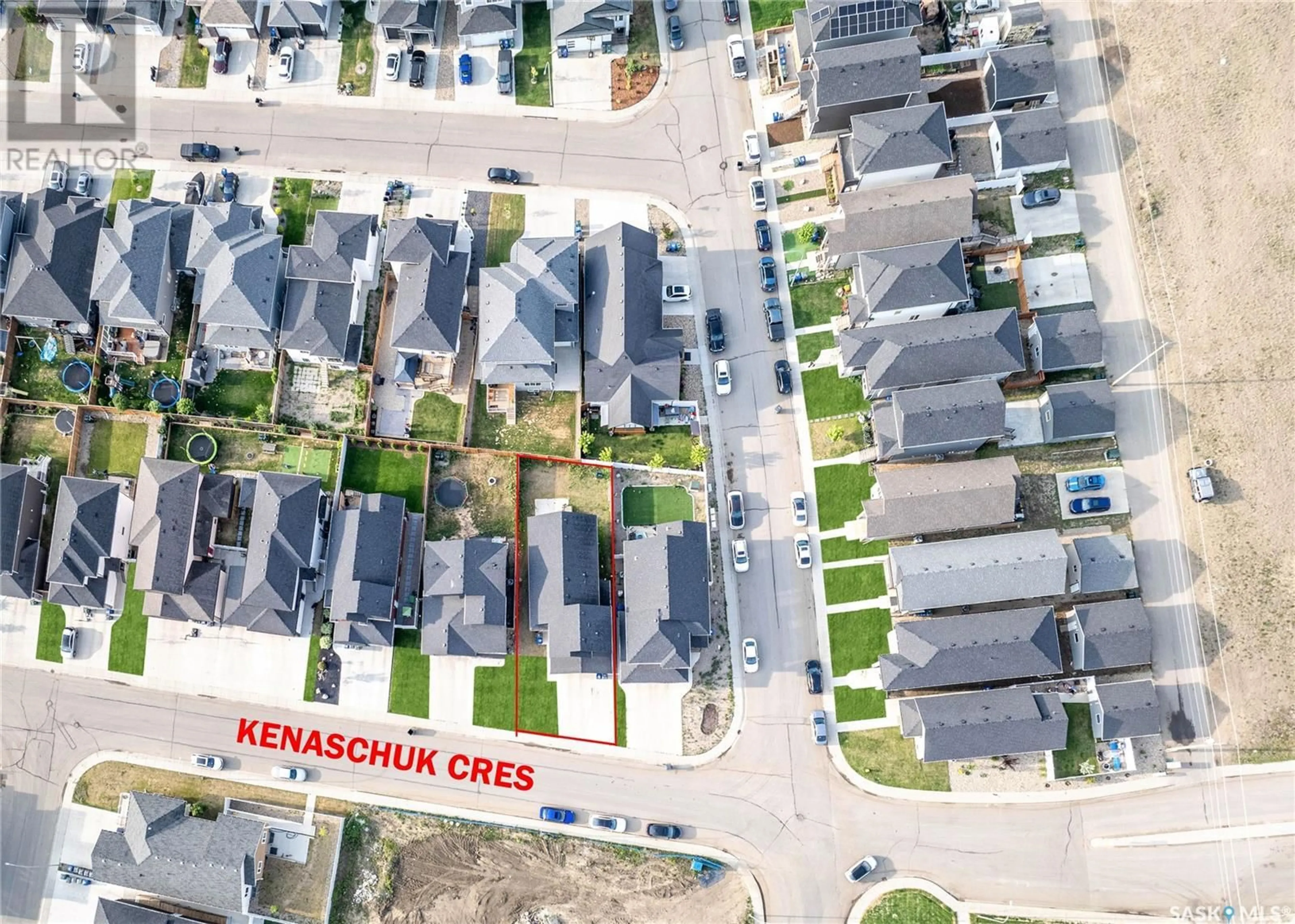 A pic from outside/outdoor area/front of a property/back of a property/a pic from drone, street for 106 KENASCHUK CRESCENT, Saskatoon Saskatchewan S7W0Y6