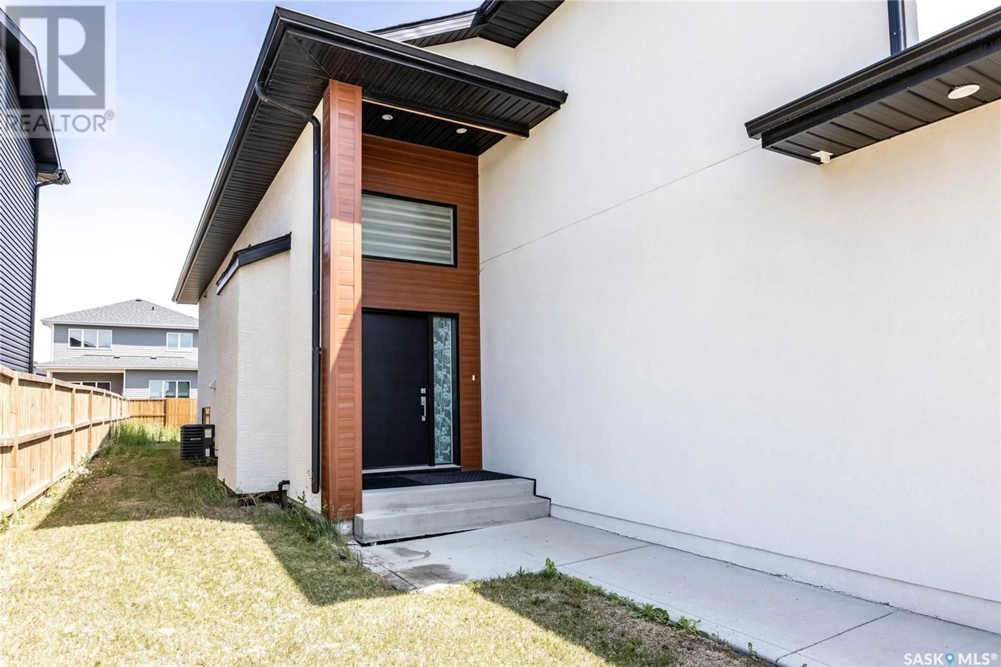 Home with brick exterior material, street for 106 KENASCHUK CRESCENT, Saskatoon Saskatchewan S7W0Y6