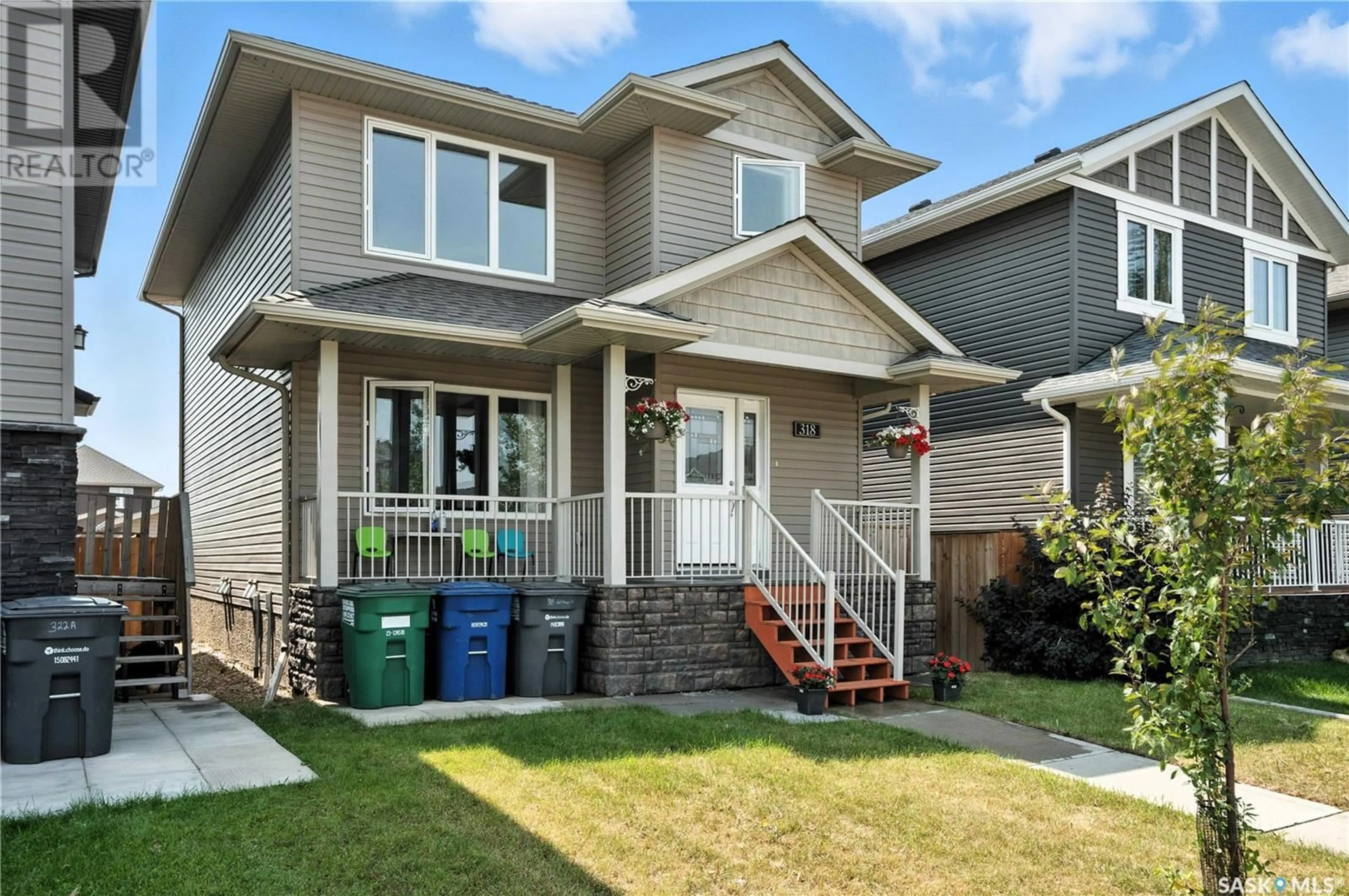 Home with vinyl exterior material, street for 318 VELTKAMP CRESCENT, Saskatoon Saskatchewan S7T0S2