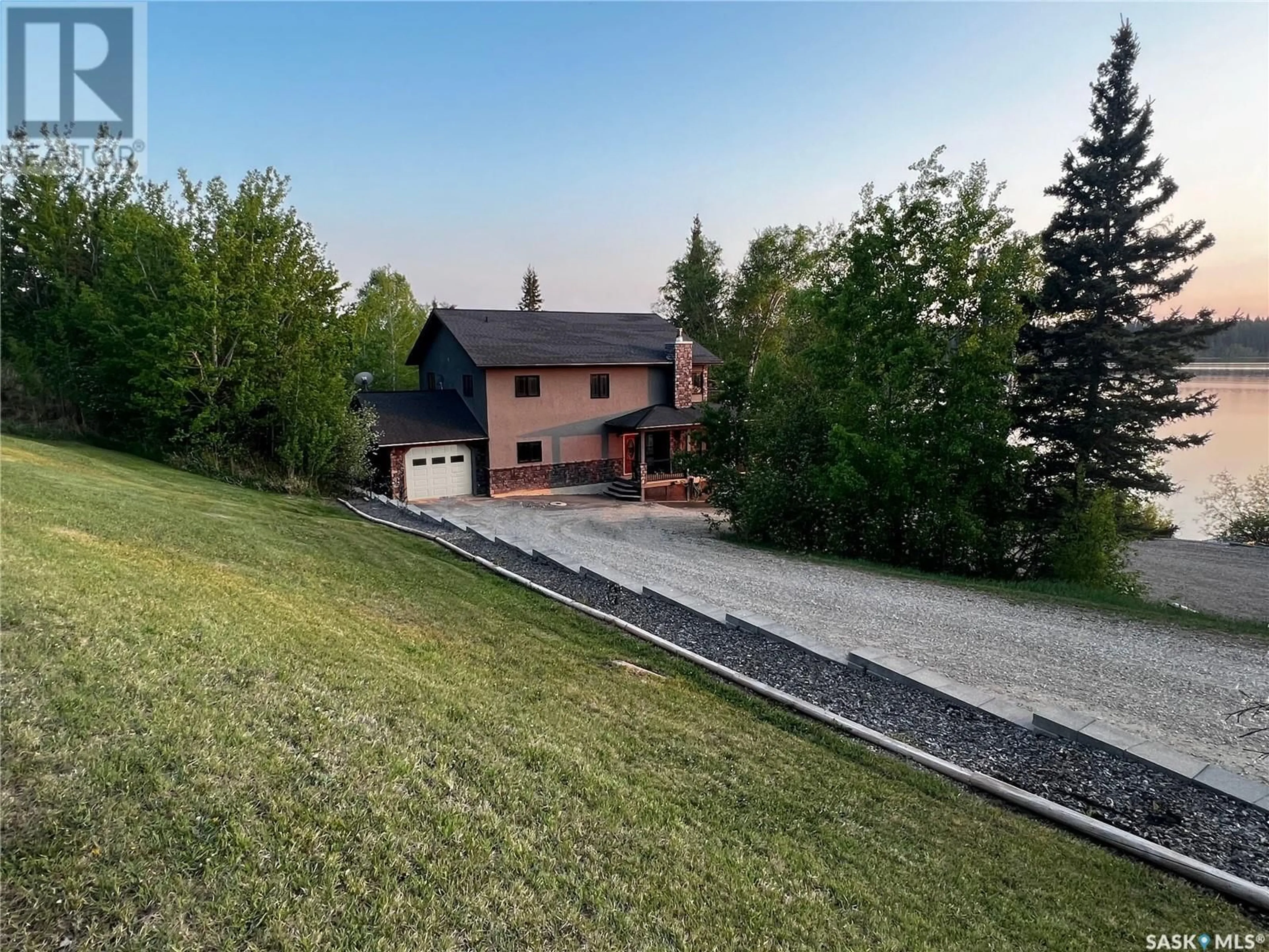 A pic from outside/outdoor area/front of a property/back of a property/a pic from drone, unknown for 15 - 16 SUNSET COVE, Big River Rm No. 555 Saskatchewan S0J0E0