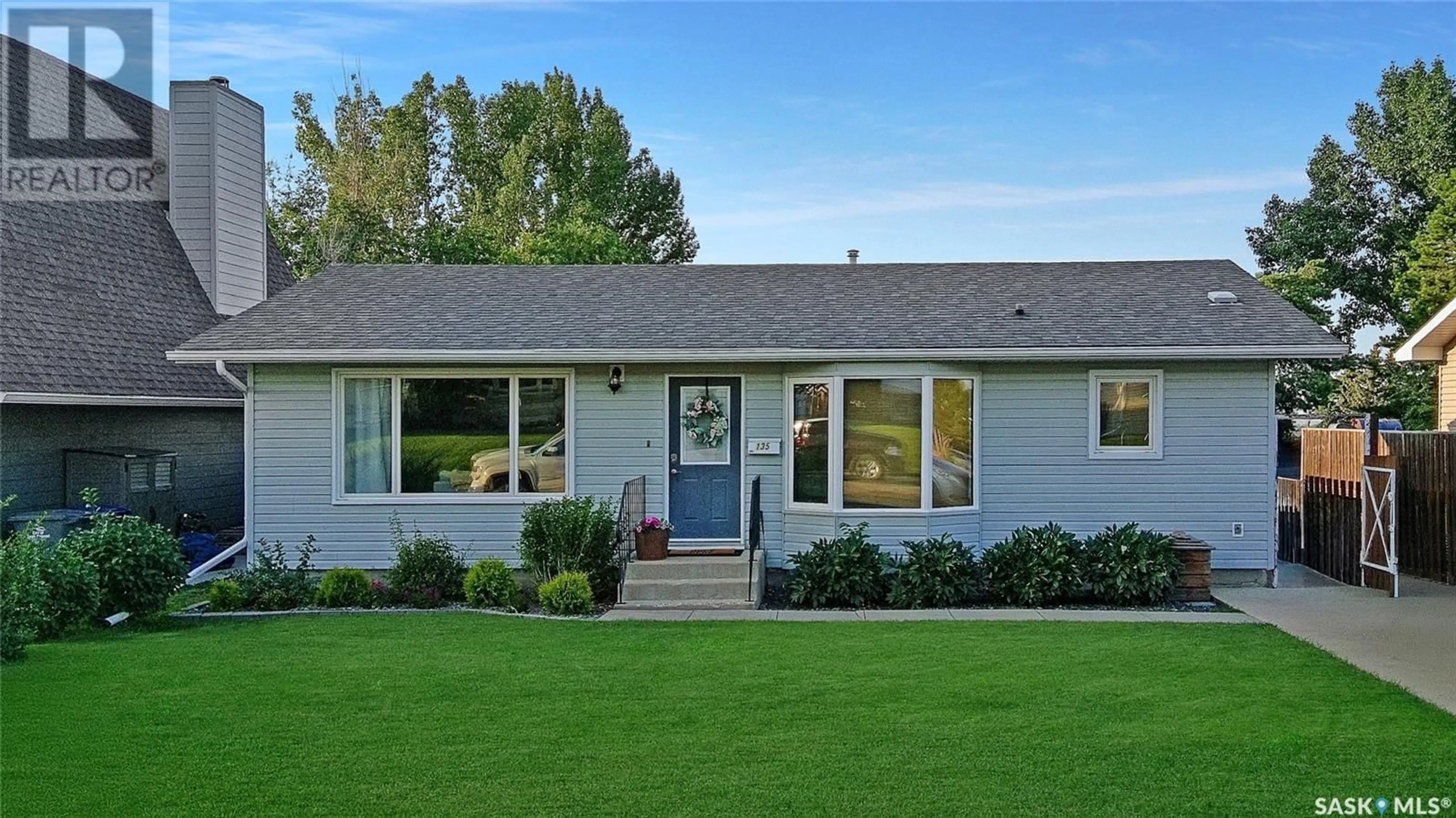 Home with vinyl exterior material, street for 135 BURKE CRESCENT, Swift Current Saskatchewan S9H4E4
