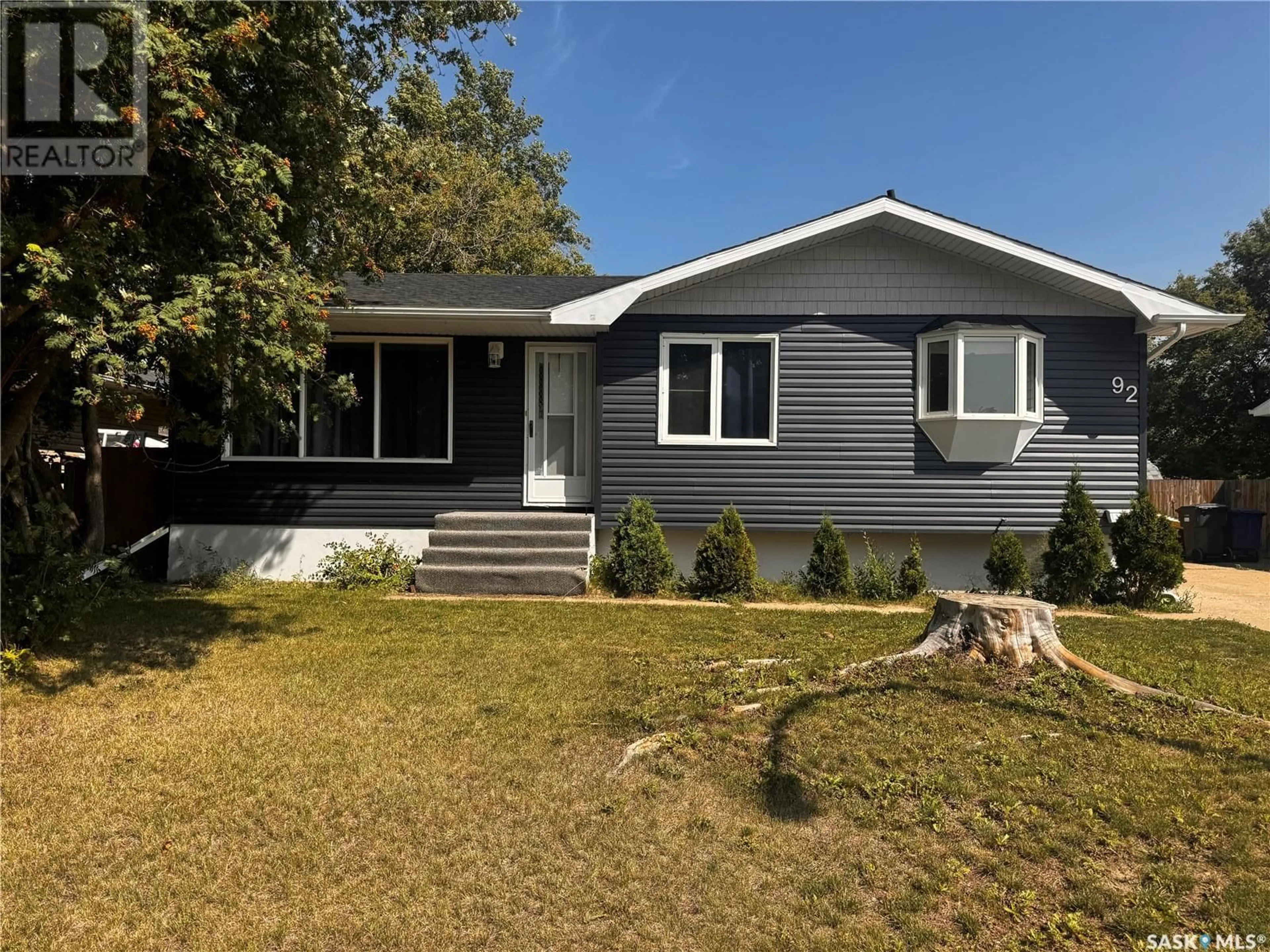 Home with vinyl exterior material, street for 92 SCOTT CRESCENT, Weyburn Saskatchewan S4H1T6
