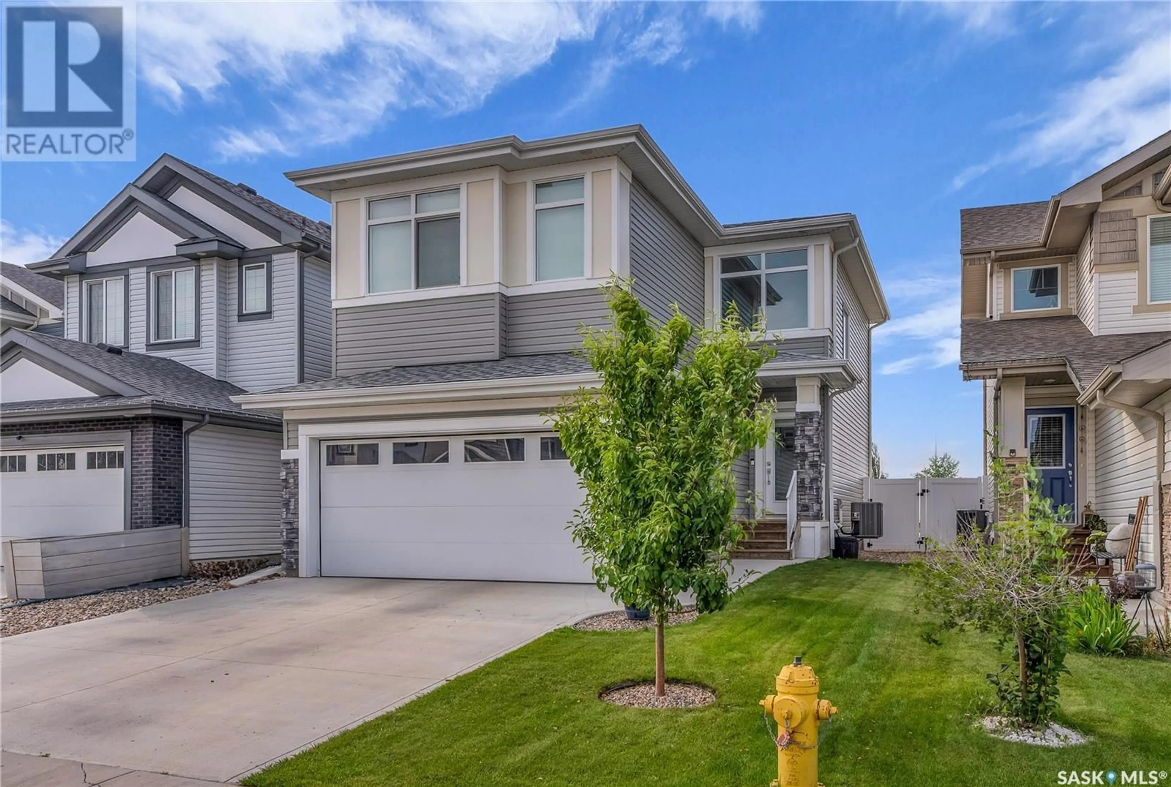 Home with vinyl exterior material, street for 435 MCFAULL CRESCENT, Saskatoon Saskatchewan S7V0T2