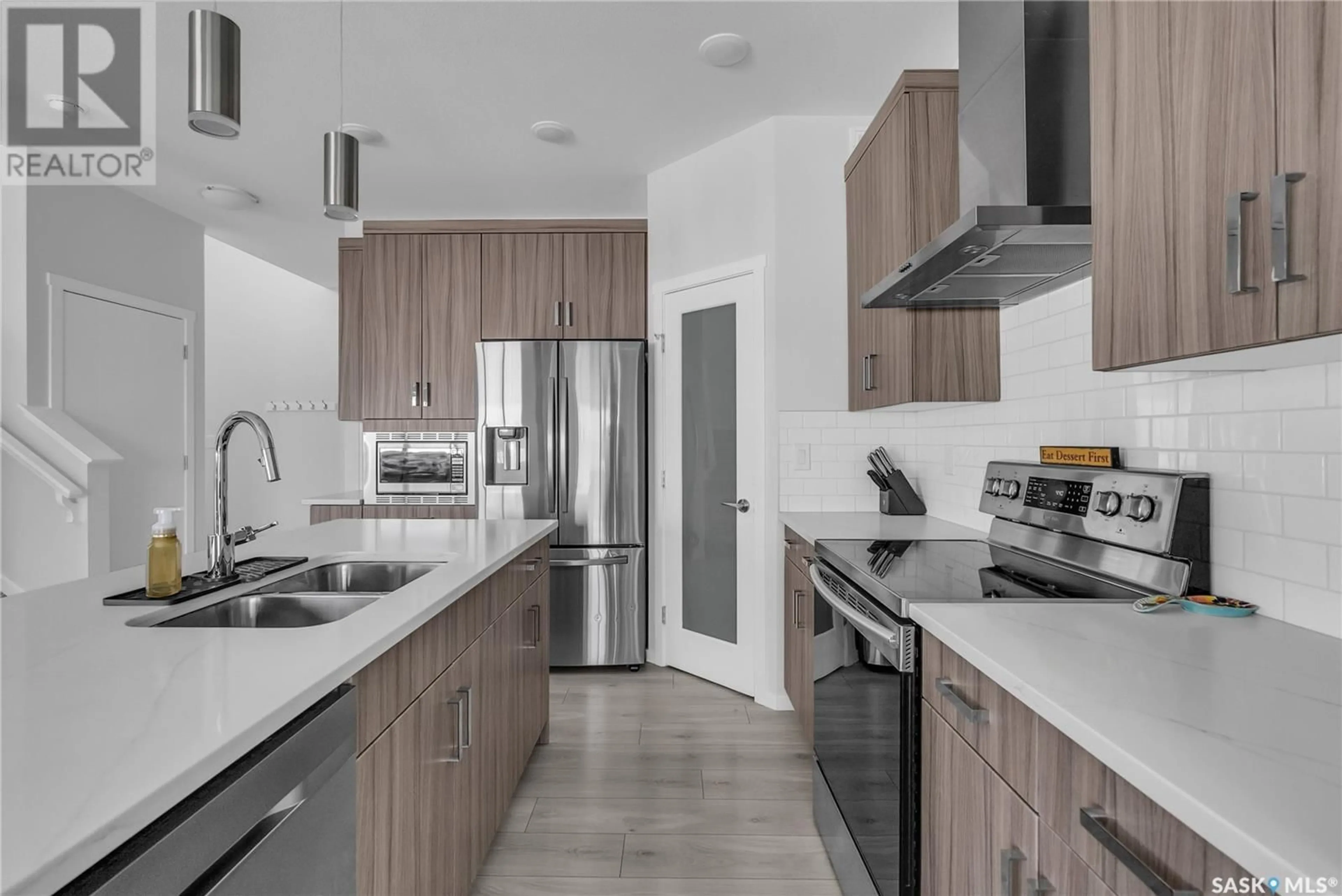 Open concept kitchen, ceramic/tile floor for 435 MCFAULL CRESCENT, Saskatoon Saskatchewan S7V0T2