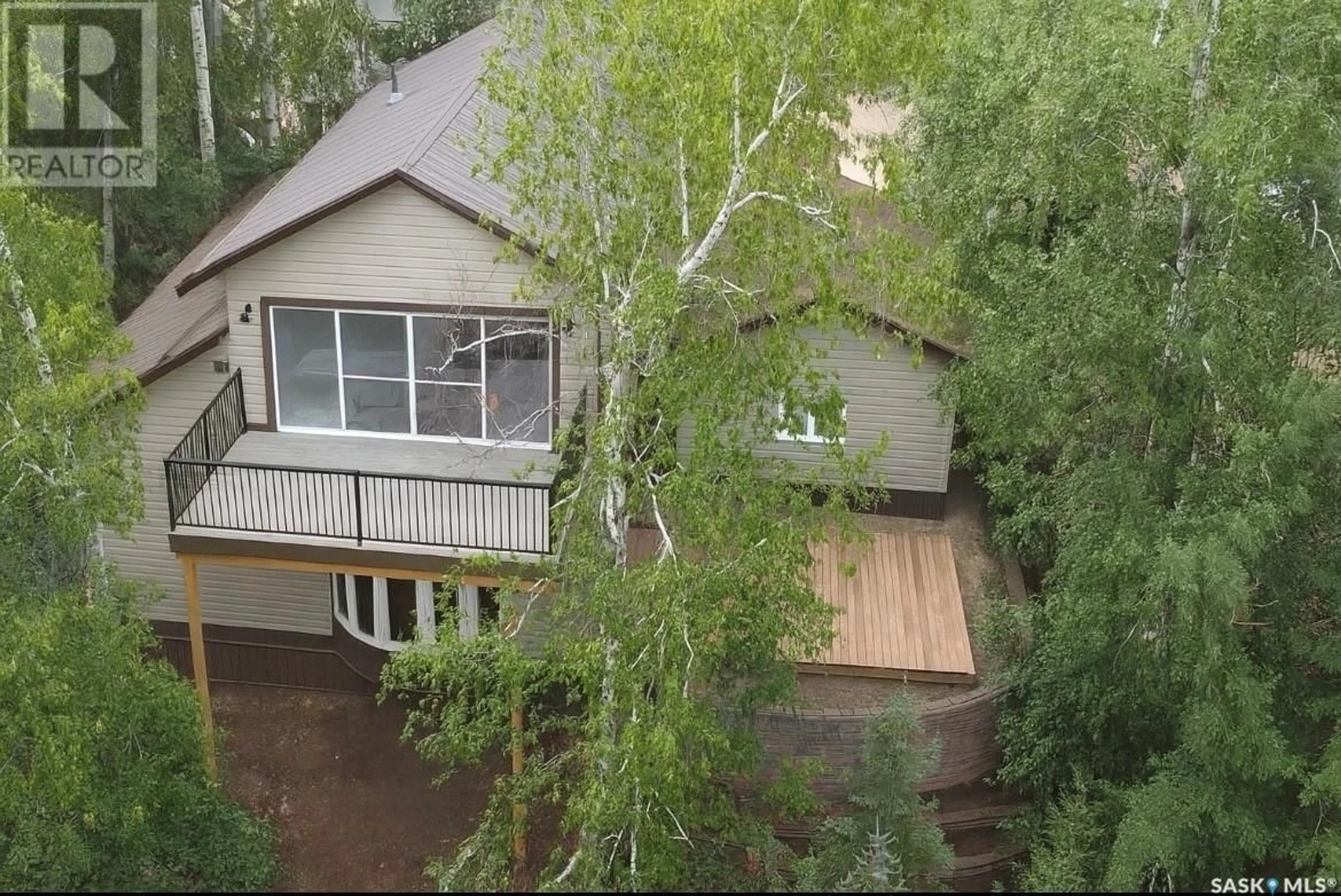 A pic from outside/outdoor area/front of a property/back of a property/a pic from drone, unknown for 224 PINE DRIVE, Tobin Lake Saskatchewan S0E1E0