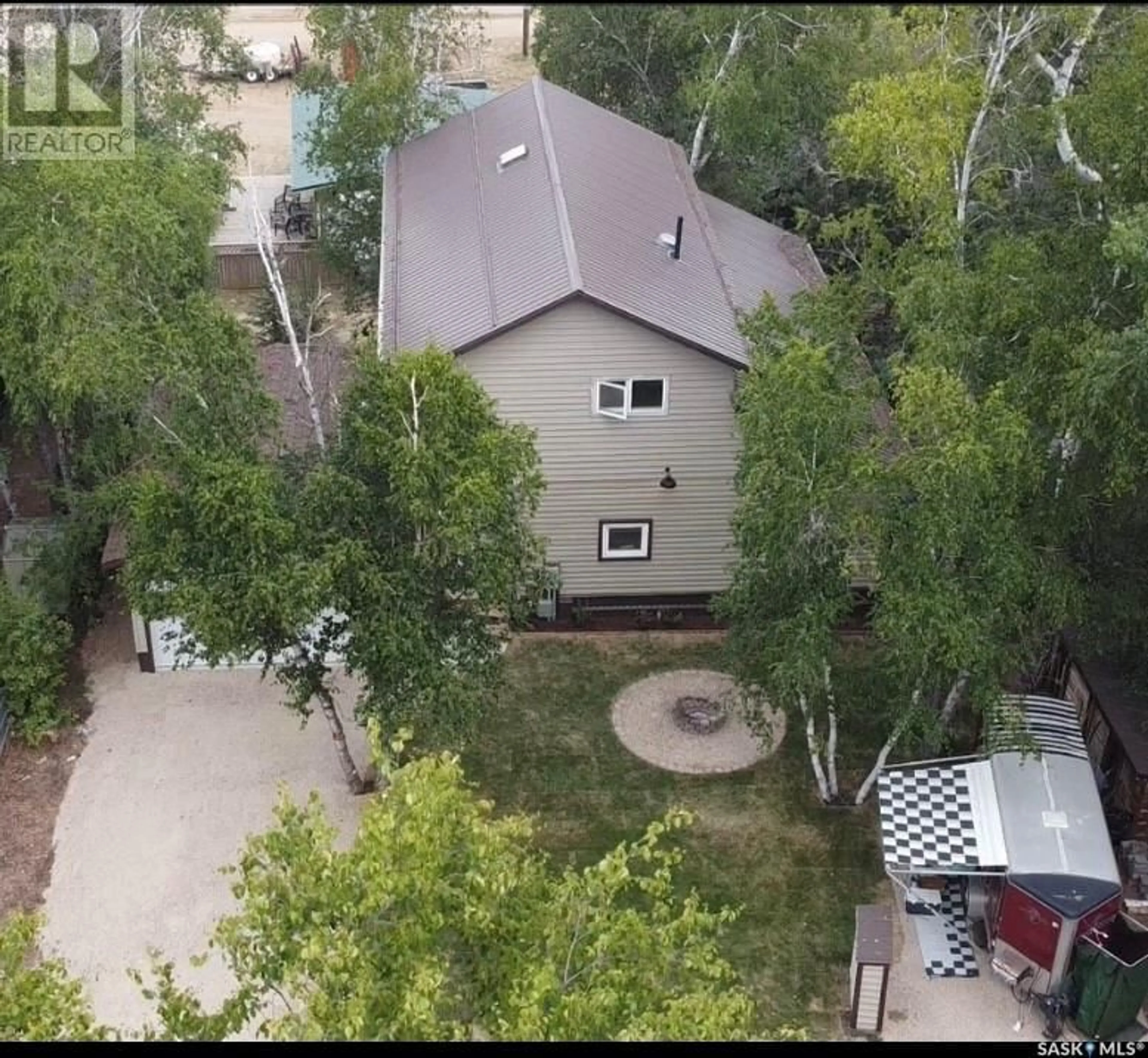 A pic from outside/outdoor area/front of a property/back of a property/a pic from drone, street for 224 PINE DRIVE, Tobin Lake Saskatchewan S0E1E0