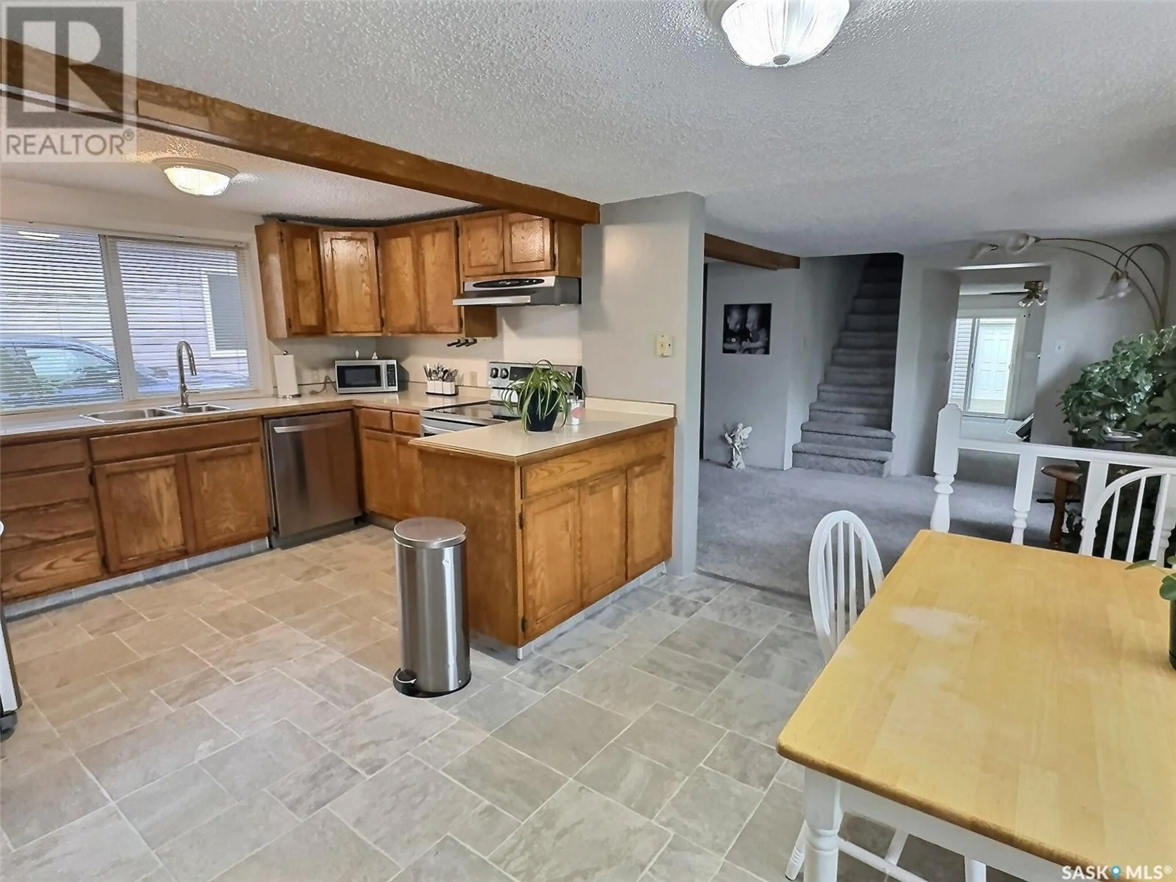 Open concept kitchen, ceramic/tile floor for 525 FIRST A STREET, Estevan Saskatchewan S4A0C4
