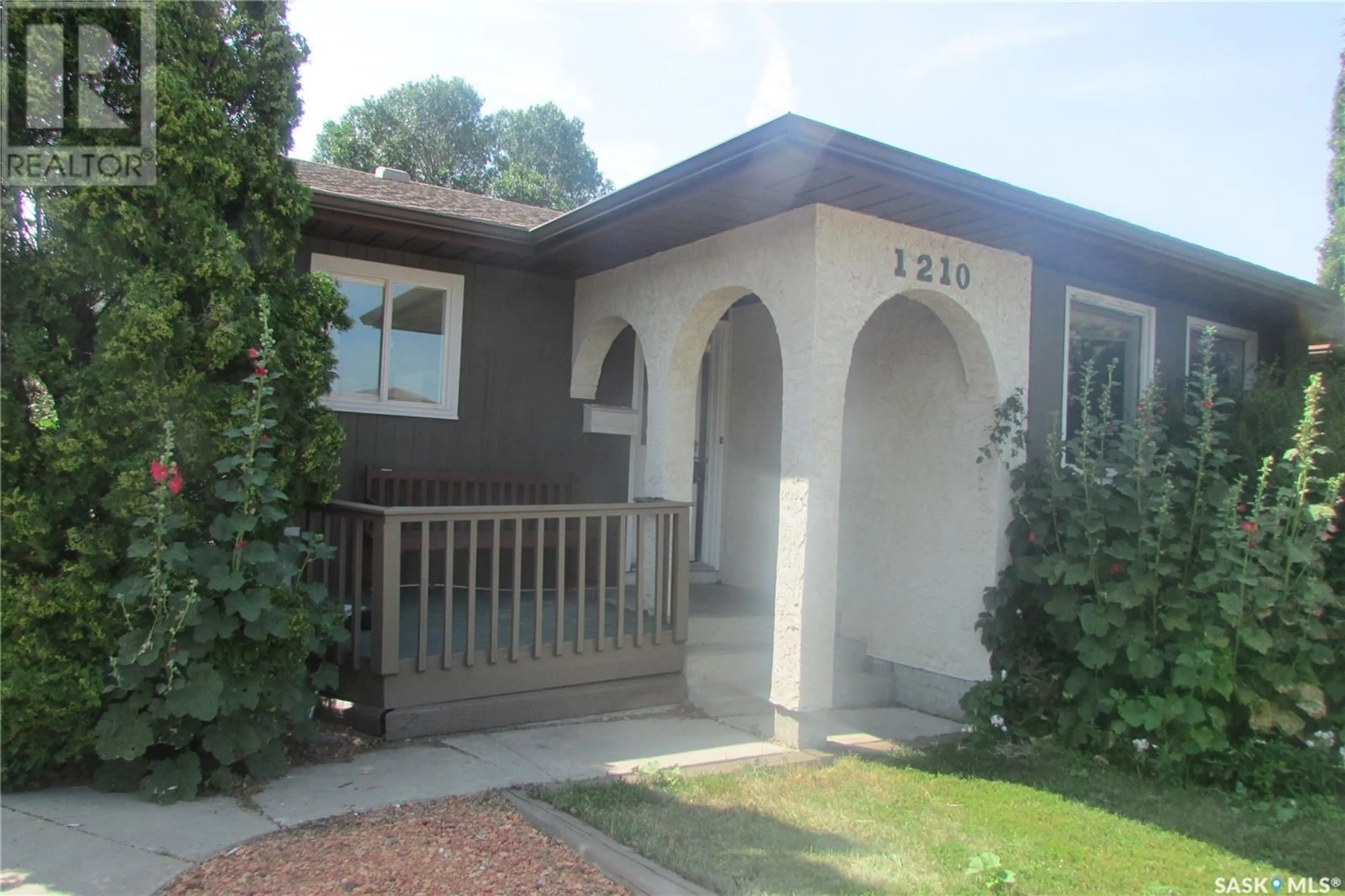 Home with vinyl exterior material, street for 1210 BROWN STREET, Regina Saskatchewan S4N6K6