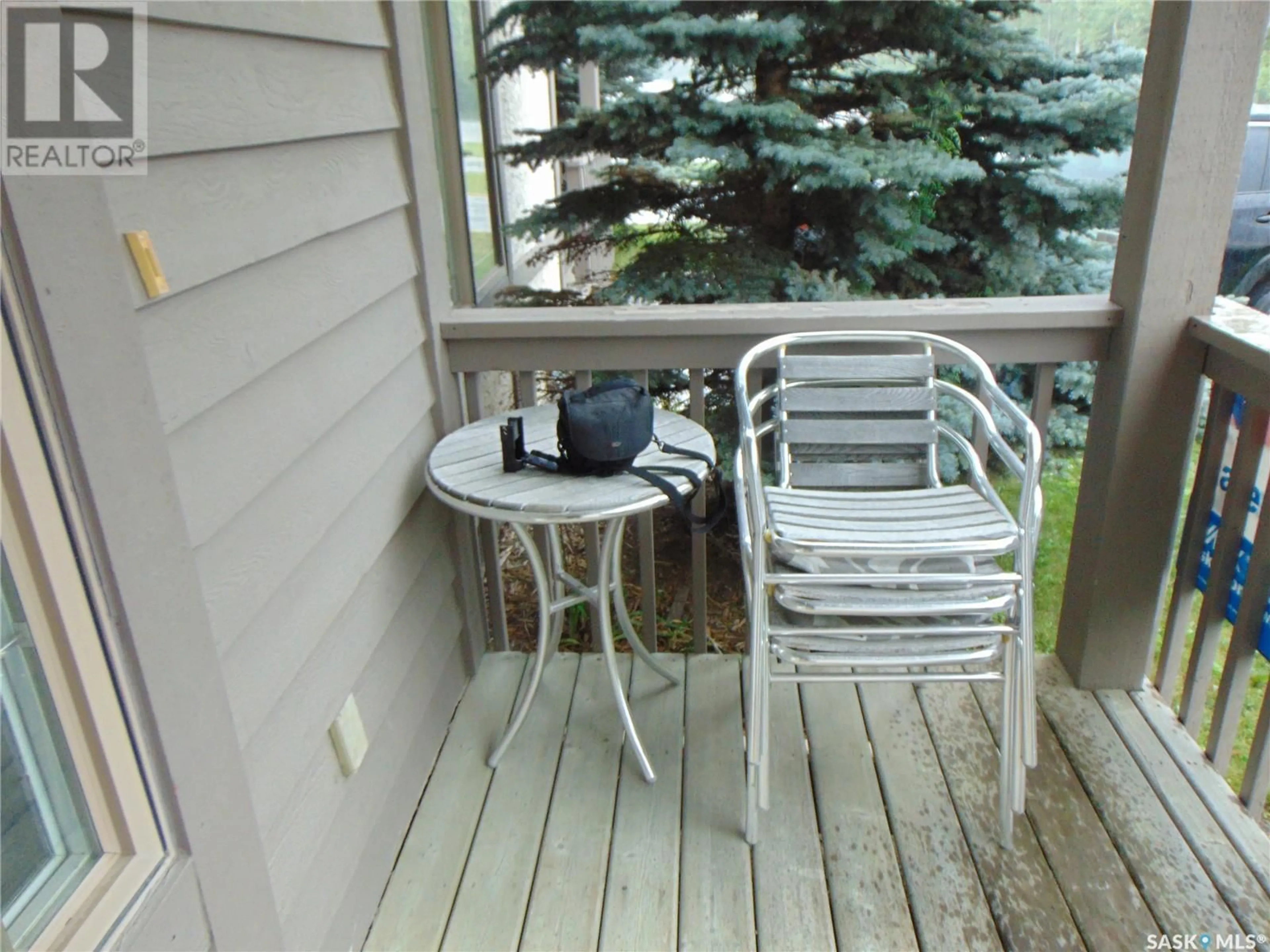 Patio, water/lake/river/ocean view for 3 FAIRWAY DRIVE, Elk Ridge Saskatchewan S0J0N0