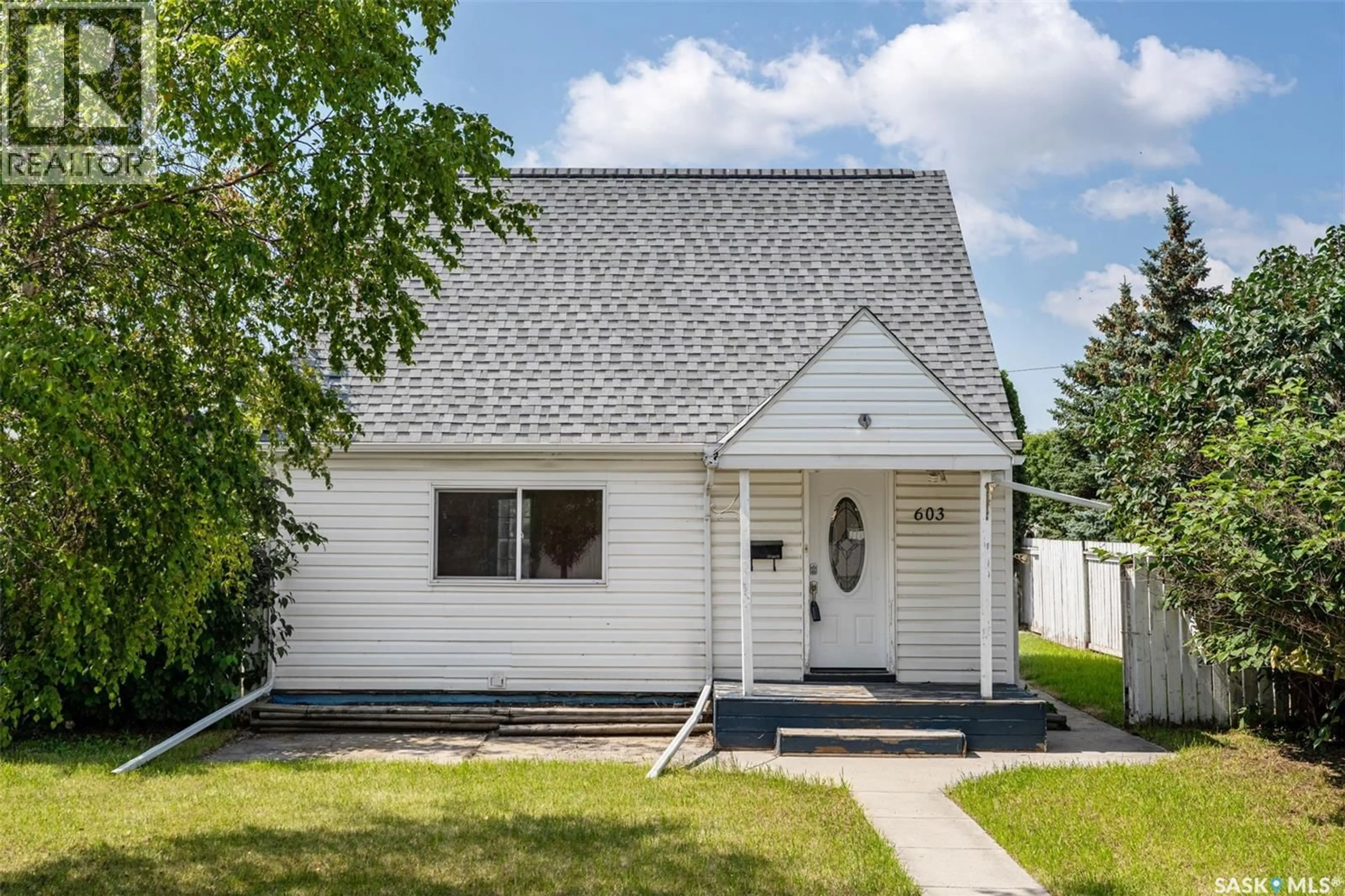 Home with vinyl exterior material, street for 603 K AVENUE, Saskatoon Saskatchewan S7M2E4