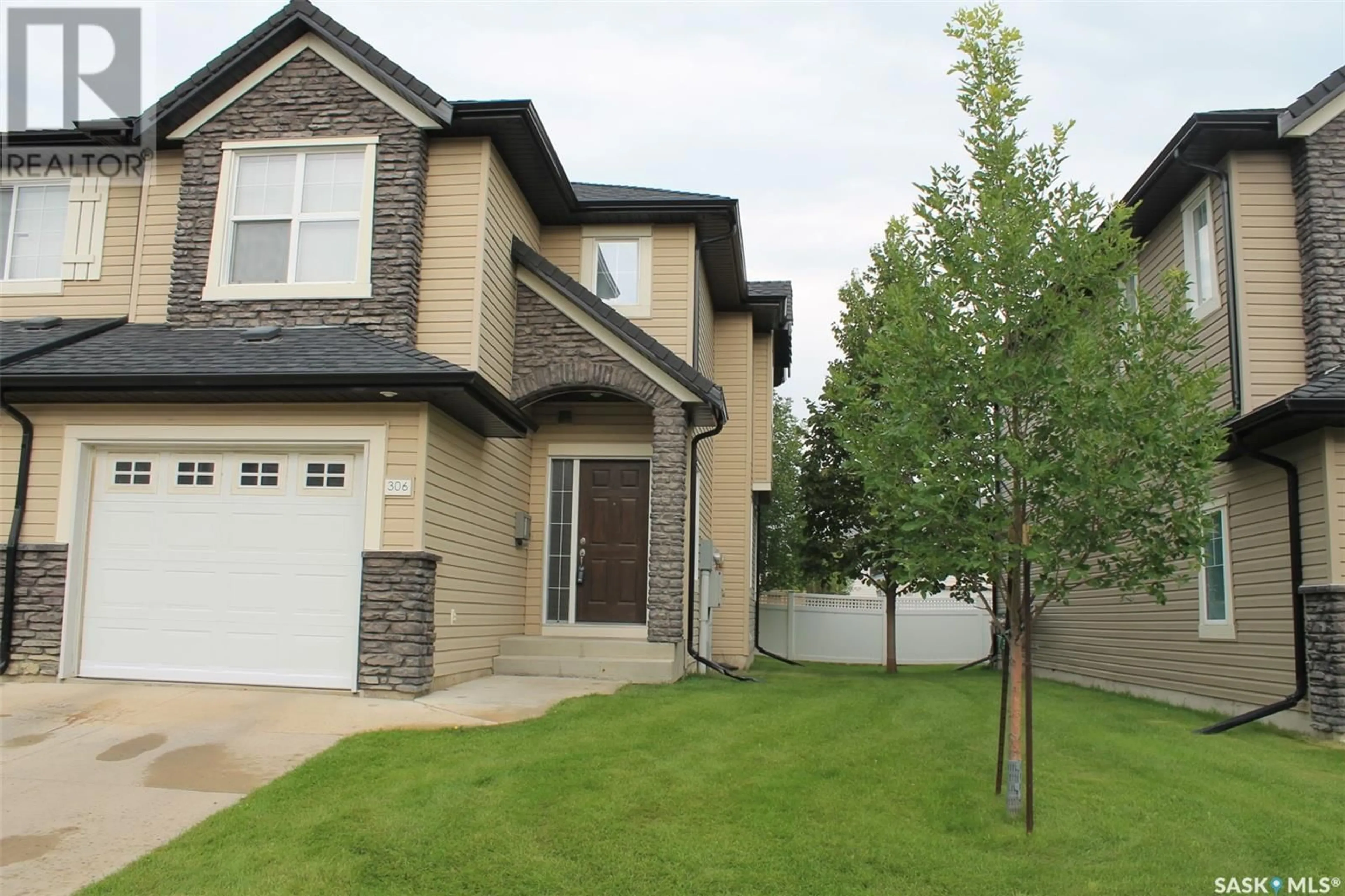 Home with brick exterior material, street for 306 - 410 LEDINGHAM WAY, Saskatoon Saskatchewan S7V0C4