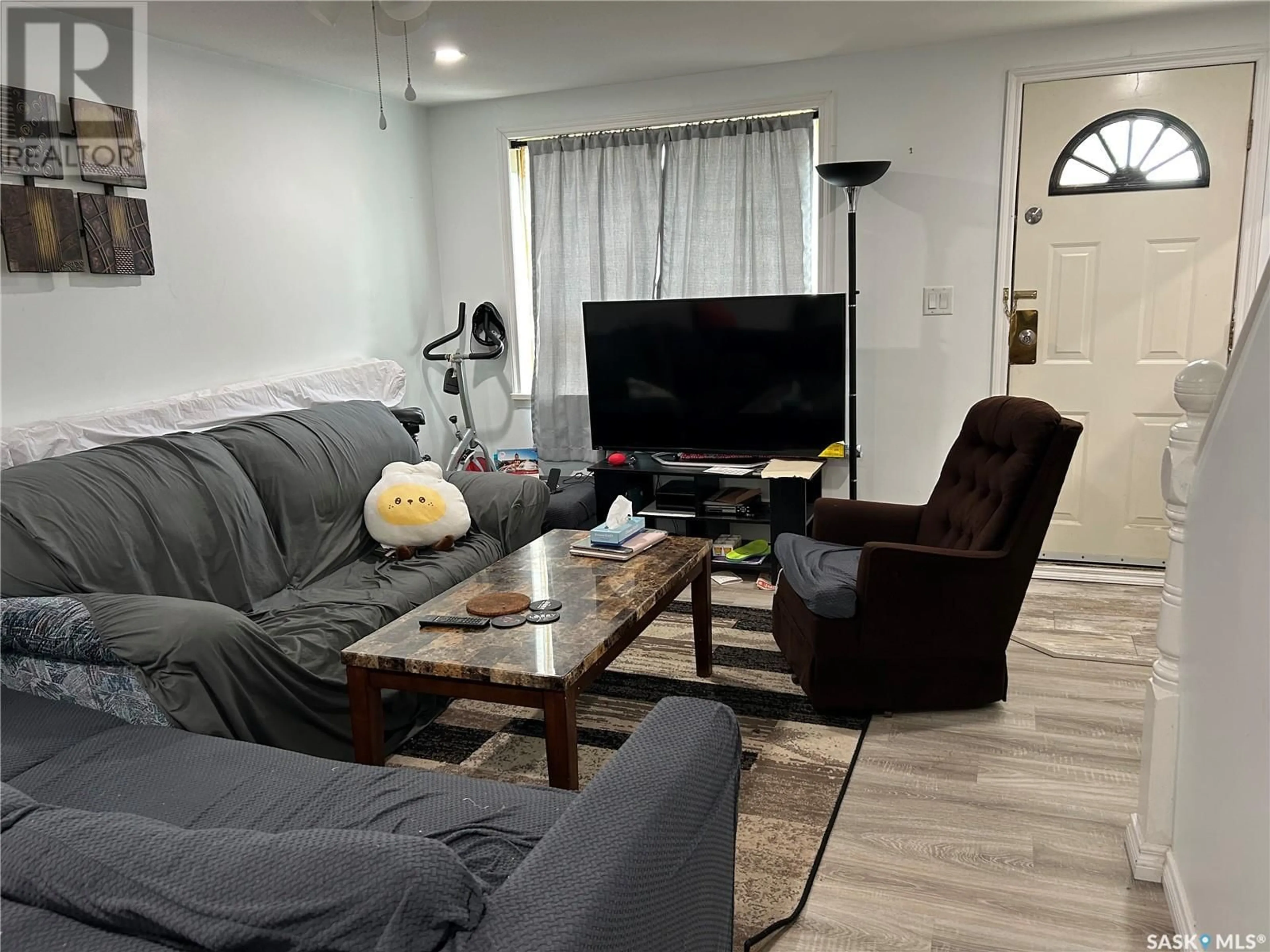 Living room with furniture, unknown for 1121 2ND STREET, Estevan Saskatchewan S4A0L8