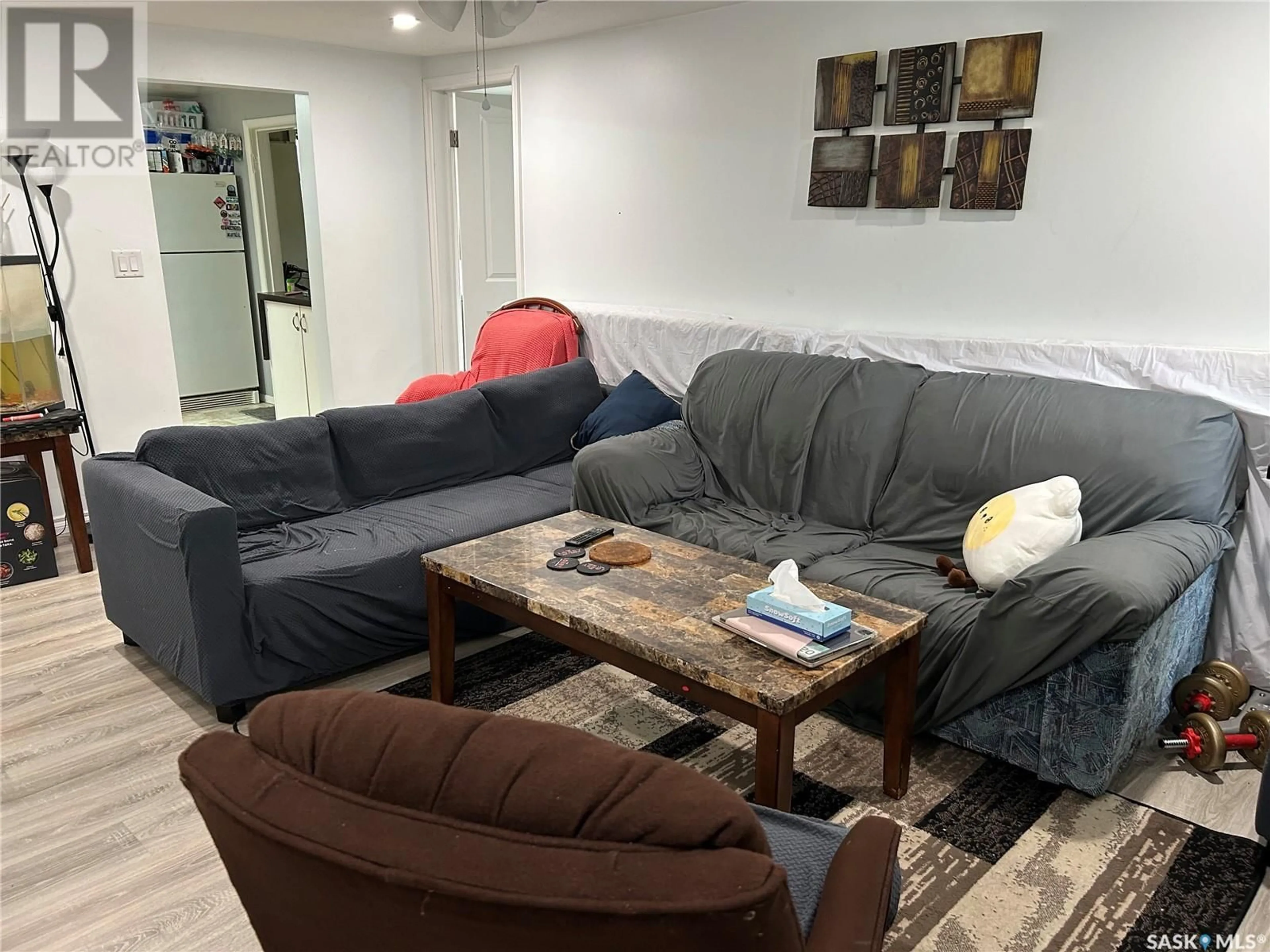 Living room with furniture, unknown for 1121 2ND STREET, Estevan Saskatchewan S4A0L8
