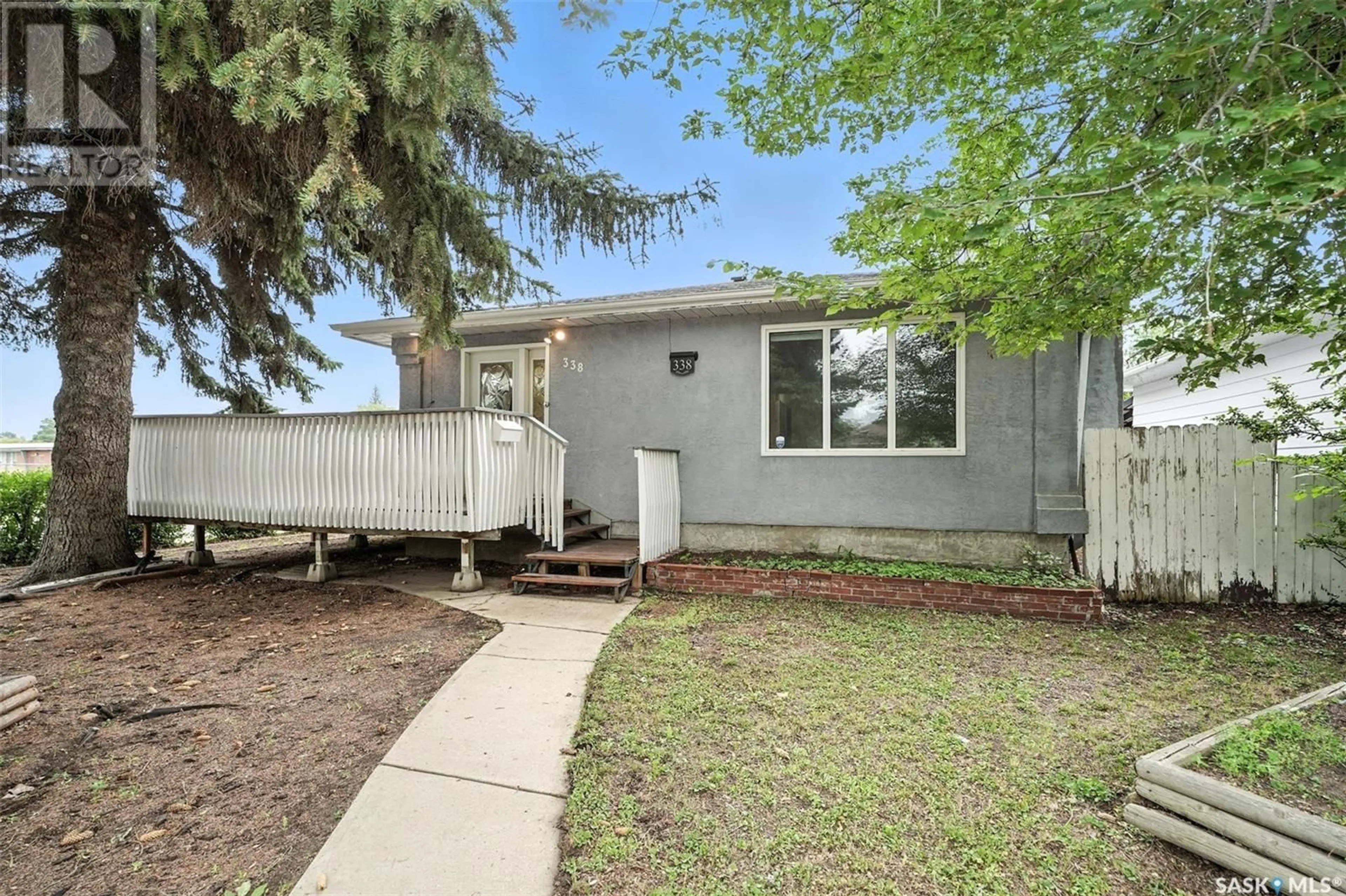 Home with vinyl exterior material, street for 338 U AVENUE, Saskatoon Saskatchewan S7L3C7