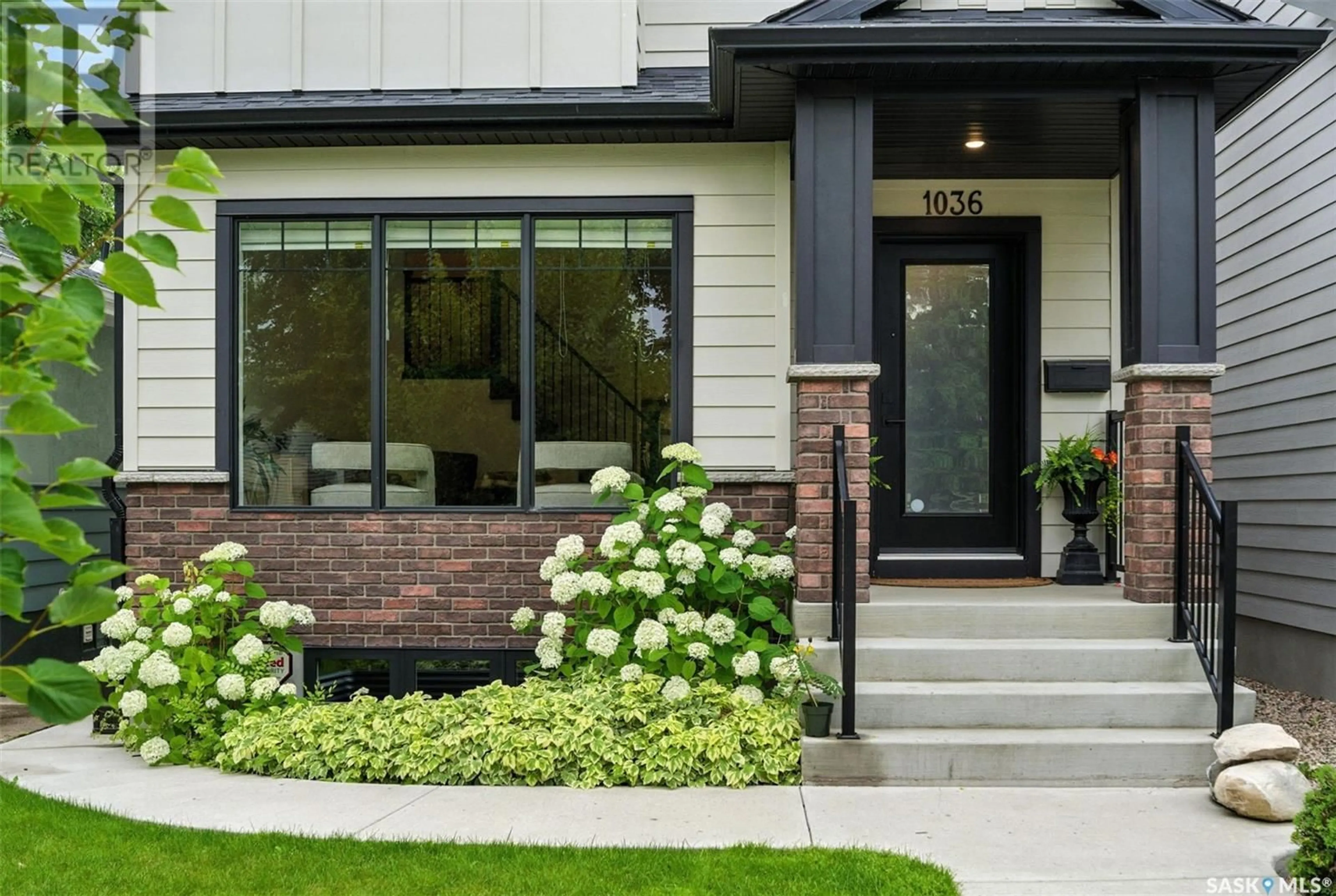 Home with brick exterior material, street for 1036 2ND STREET, Saskatoon Saskatchewan S7H1R3
