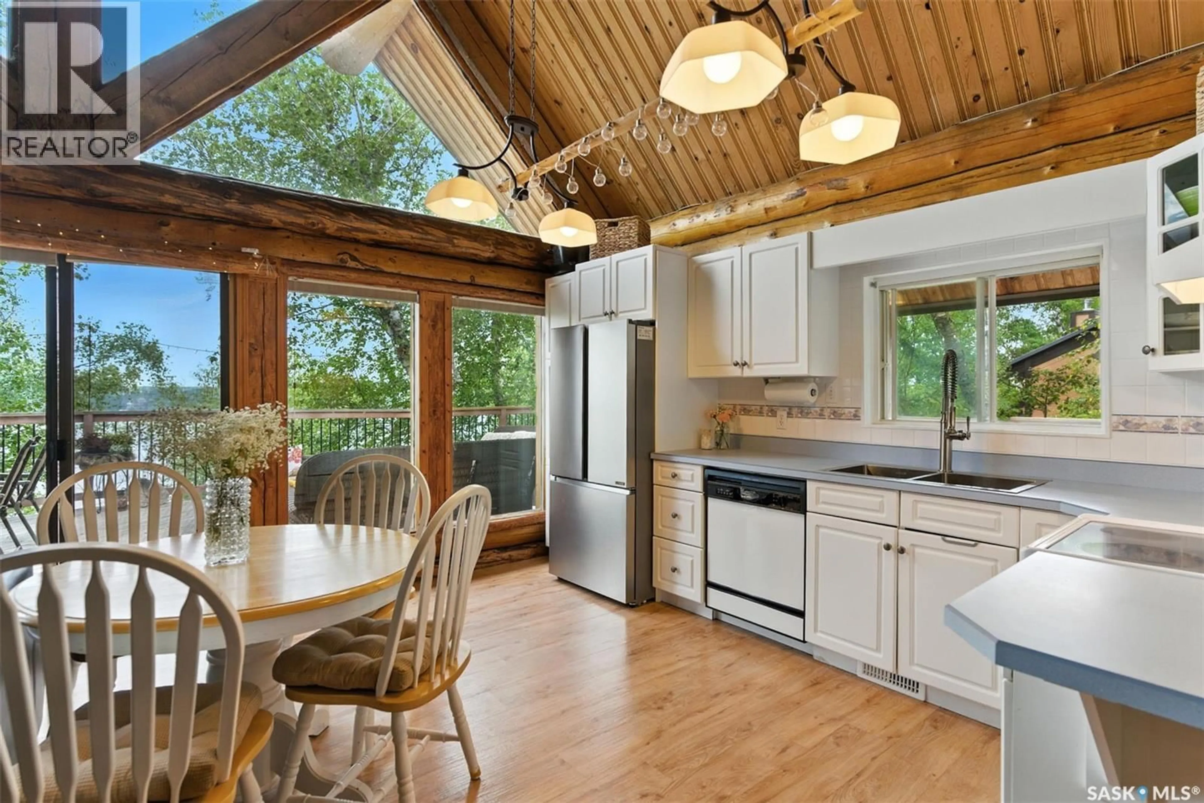 Open concept kitchen, wood/laminate floor for 3428 NICKORICK BEACH, Wakaw Lake Saskatchewan S0K4P0