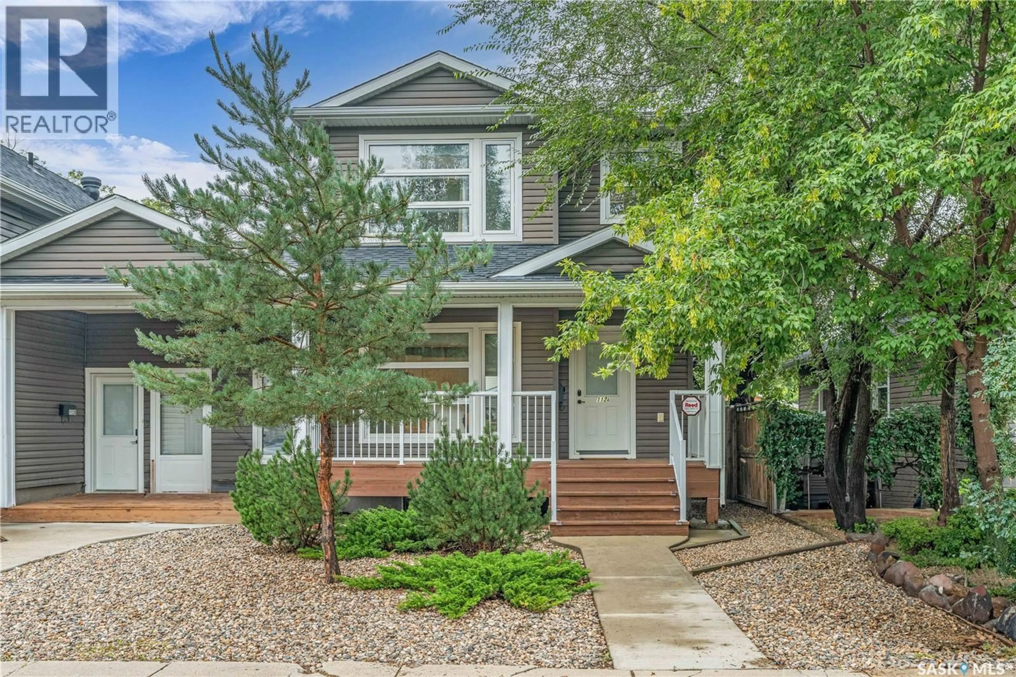 Home with vinyl exterior material, street for 112A 109TH STREET, Saskatoon Saskatchewan S7N2Z2