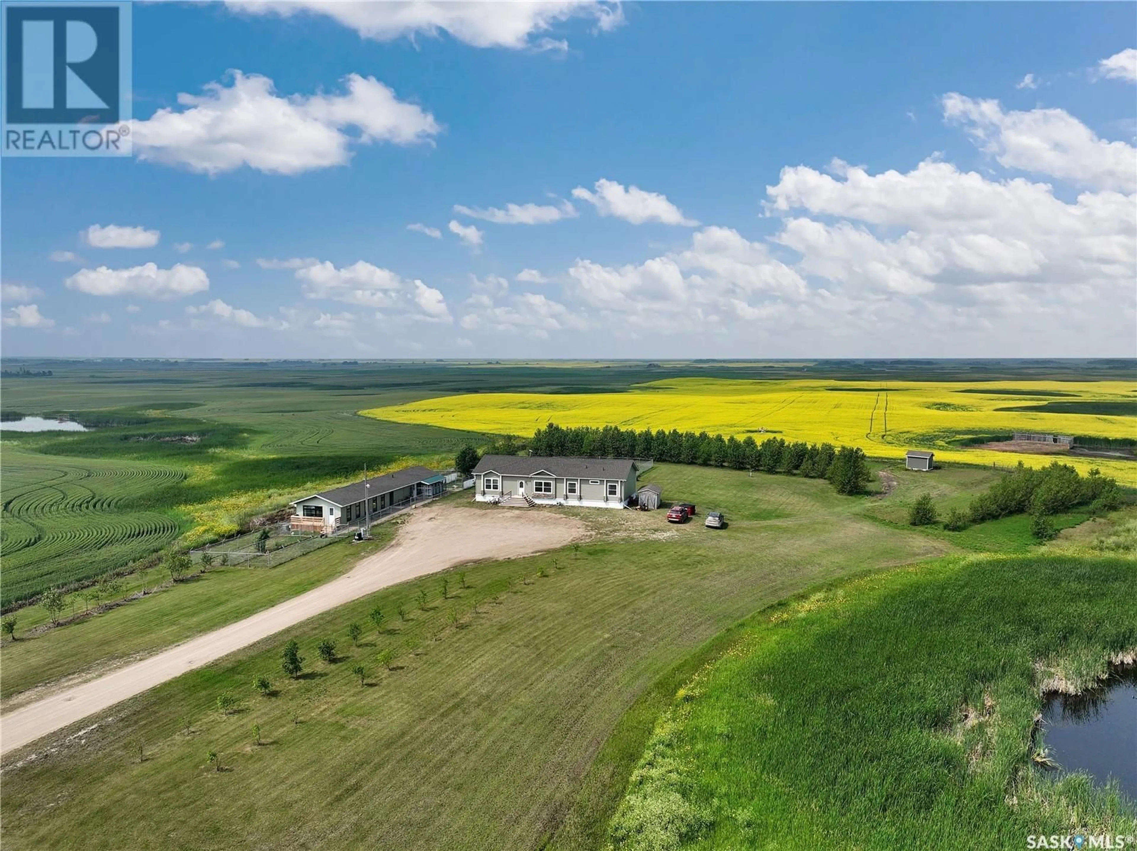 A pic from outside/outdoor area/front of a property/back of a property/a pic from drone, unknown for ENVY DOG HOUSE ACREAGE, Silverwood Rm No. 123 Saskatchewan S0G4Z0