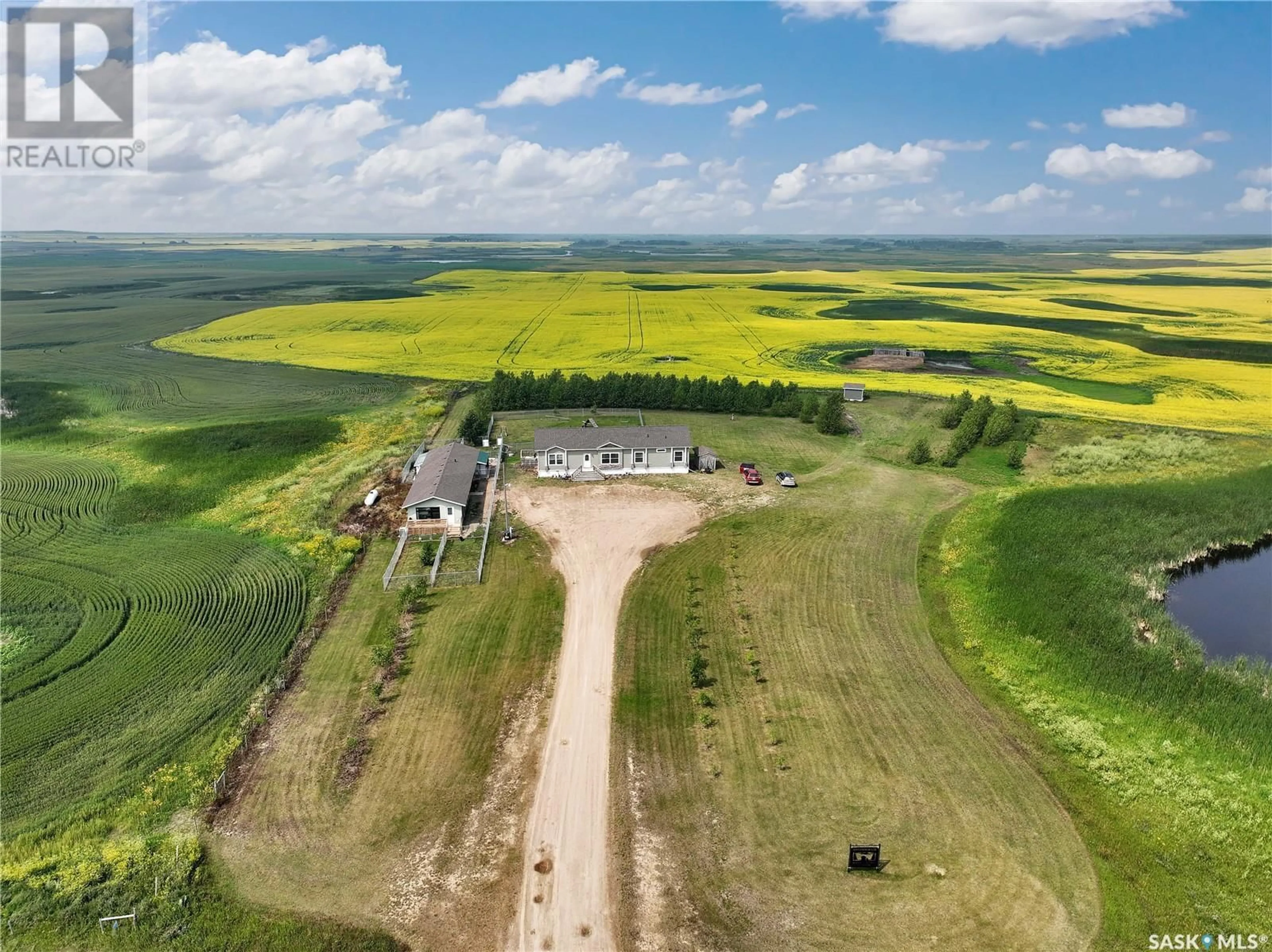 A pic from outside/outdoor area/front of a property/back of a property/a pic from drone, building for ENVY DOG HOUSE ACREAGE, Silverwood Rm No. 123 Saskatchewan S0G4Z0