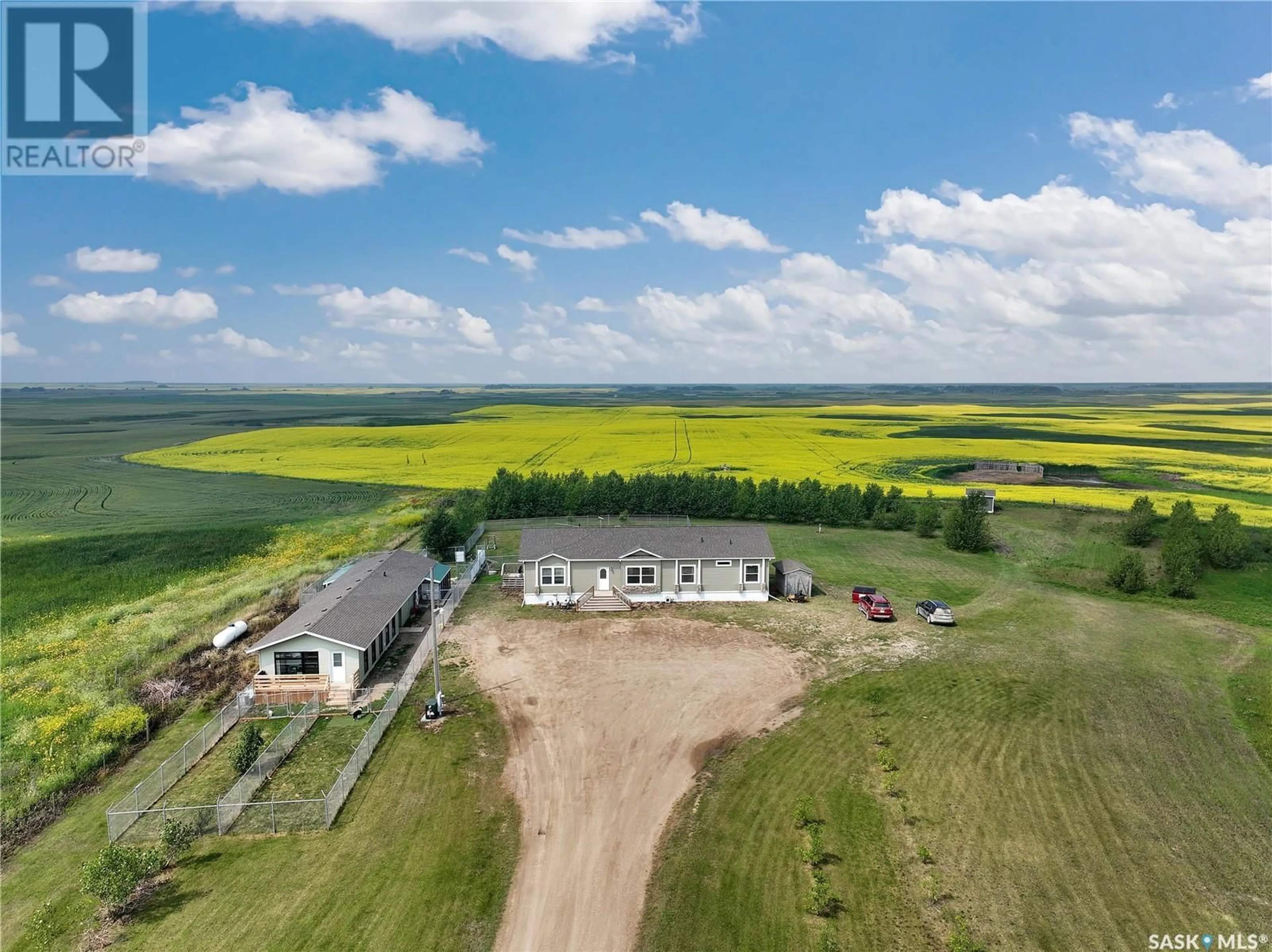 A pic from outside/outdoor area/front of a property/back of a property/a pic from drone, building for ENVY DOG HOUSE ACREAGE, Silverwood Rm No. 123 Saskatchewan S0G4Z0