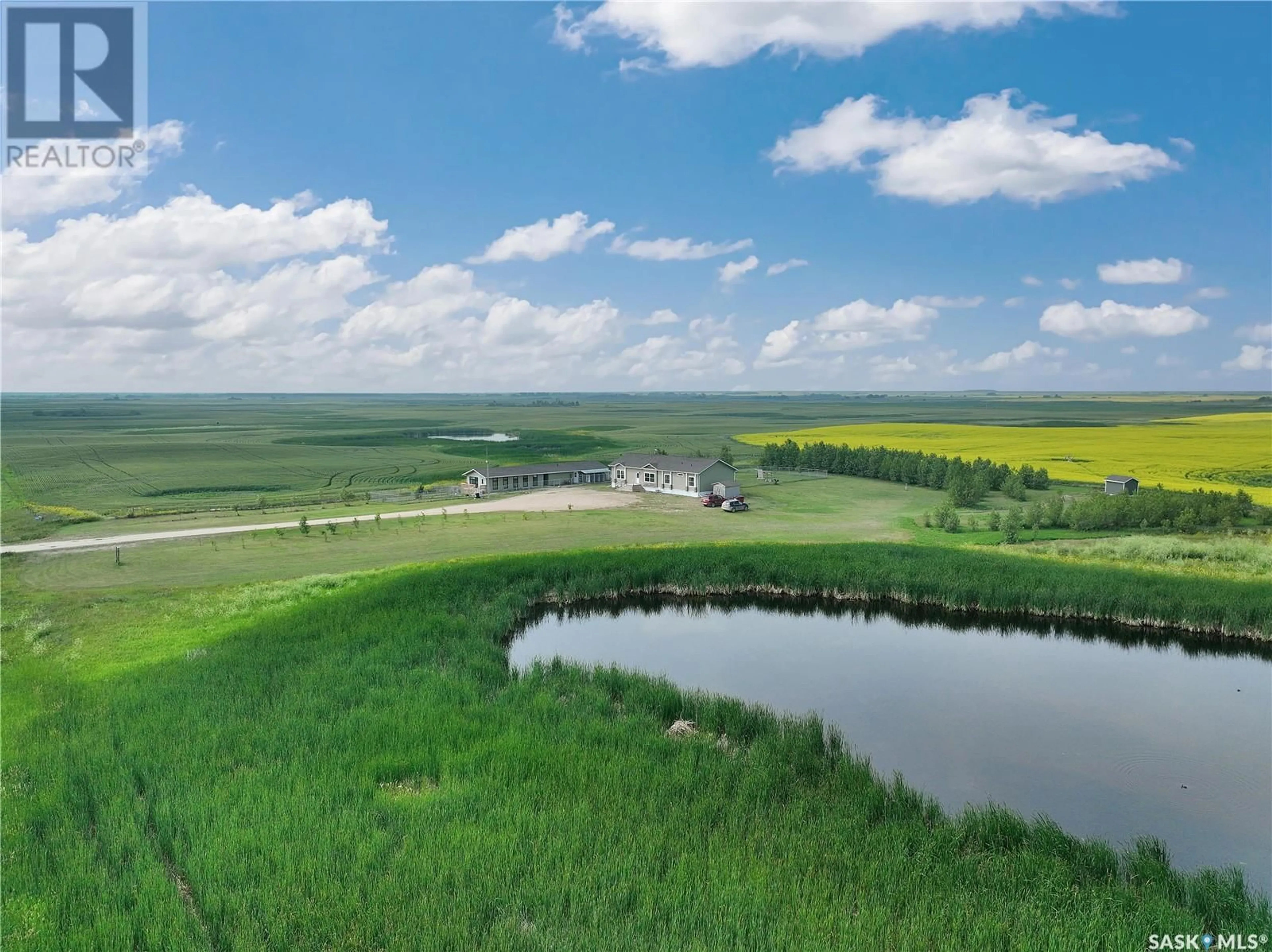 A pic from outside/outdoor area/front of a property/back of a property/a pic from drone, water/lake/river/ocean view for ENVY DOG HOUSE ACREAGE, Silverwood Rm No. 123 Saskatchewan S0G4Z0