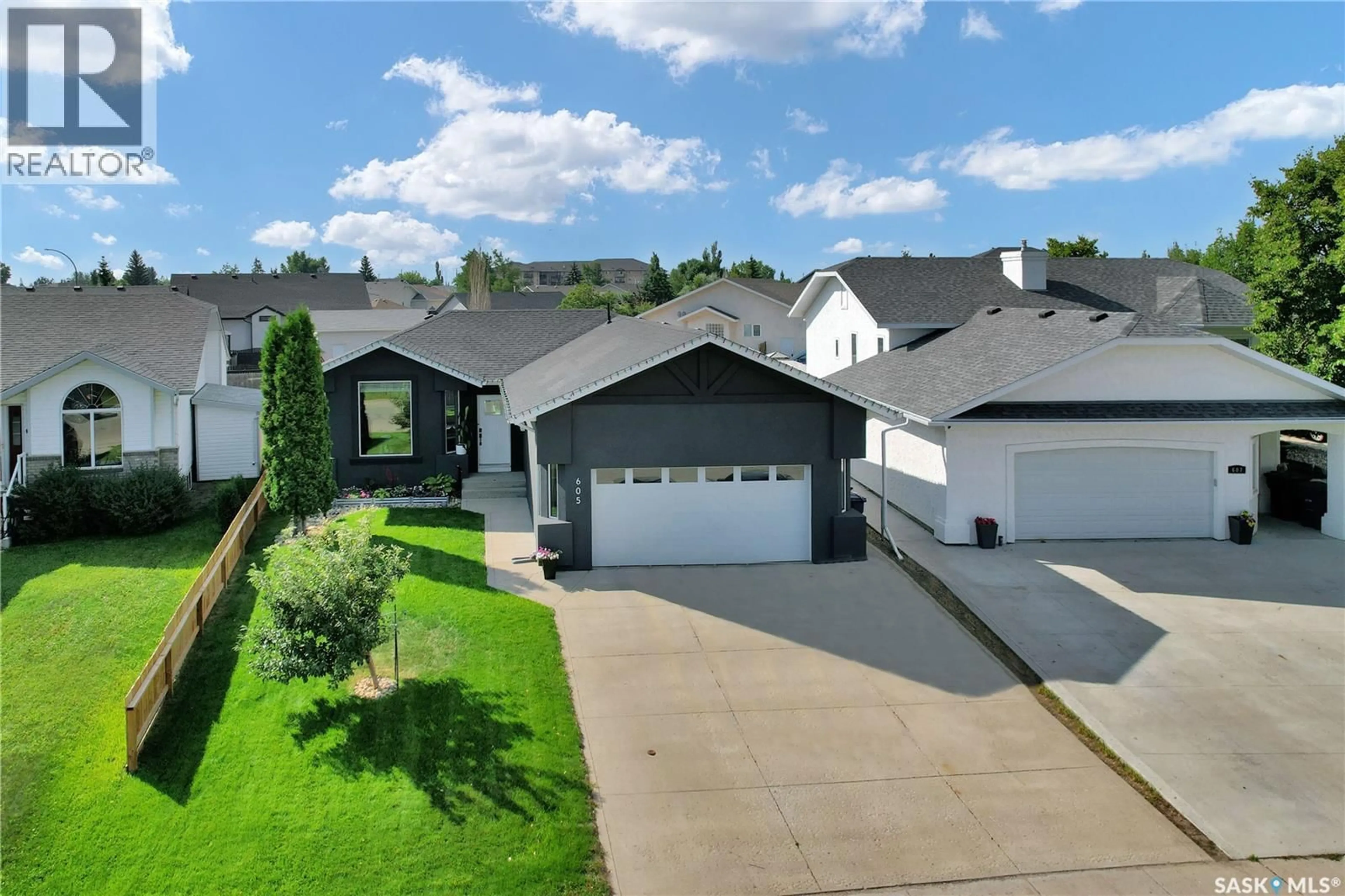 A pic from outside/outdoor area/front of a property/back of a property/a pic from drone, street for 605 4TH STREET, Warman Saskatchewan S0K4S0