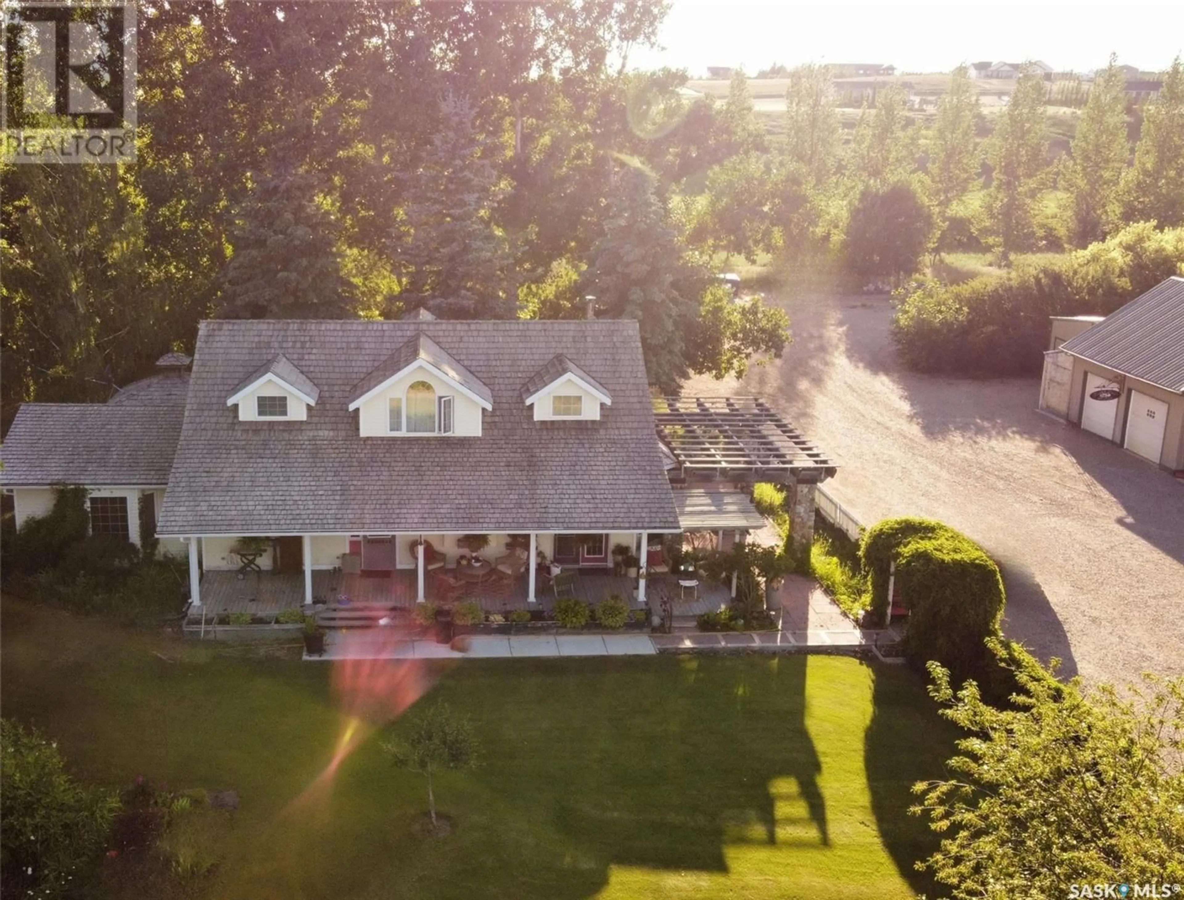 A pic from outside/outdoor area/front of a property/back of a property/a pic from drone, water/lake/river/ocean view for GREEN ACRES, Swift Current Rm No. 137 Saskatchewan S9H3X4