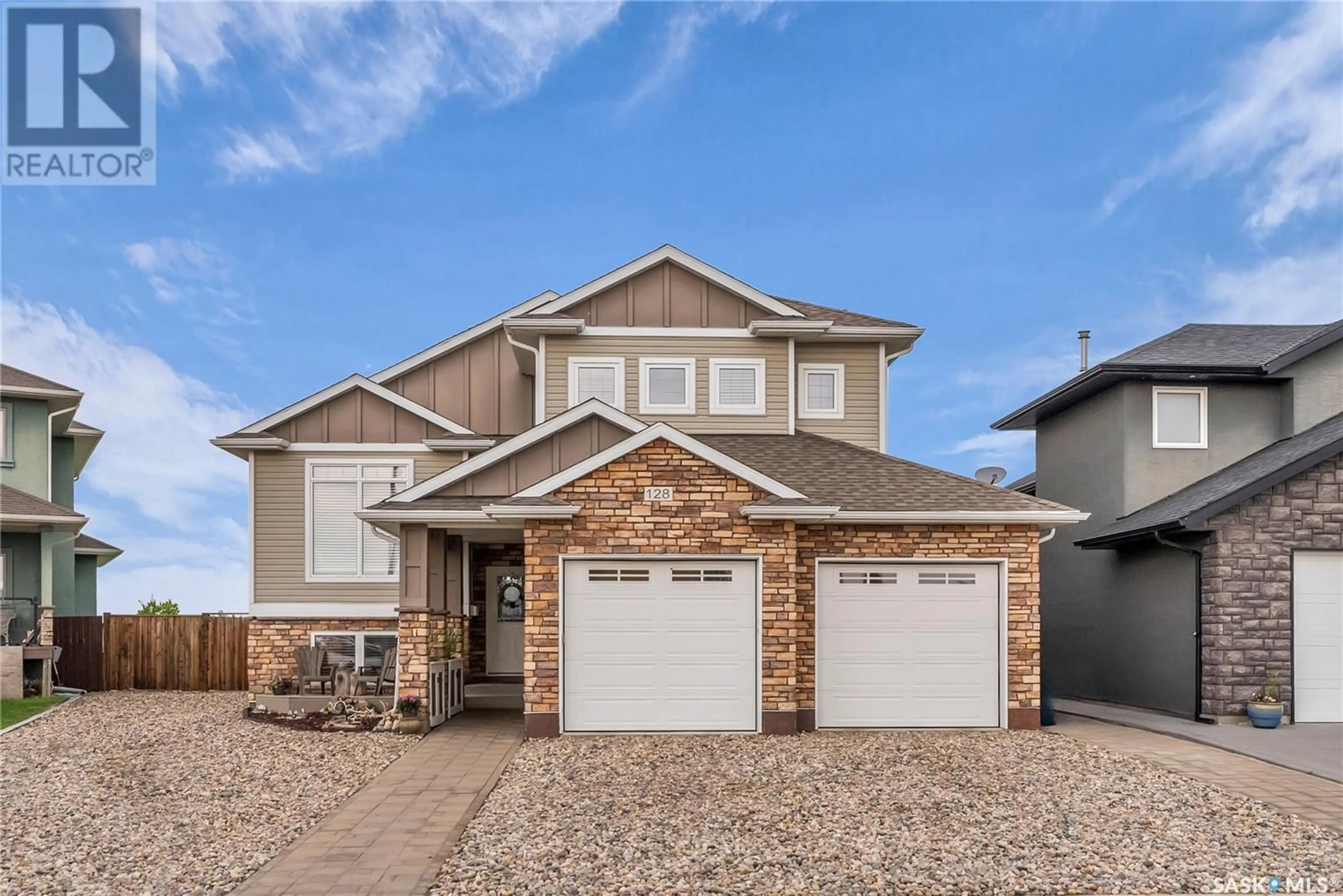 Home with vinyl exterior material, street for 128 KINSMEN CRESCENT, Martensville Saskatchewan S0K0A2