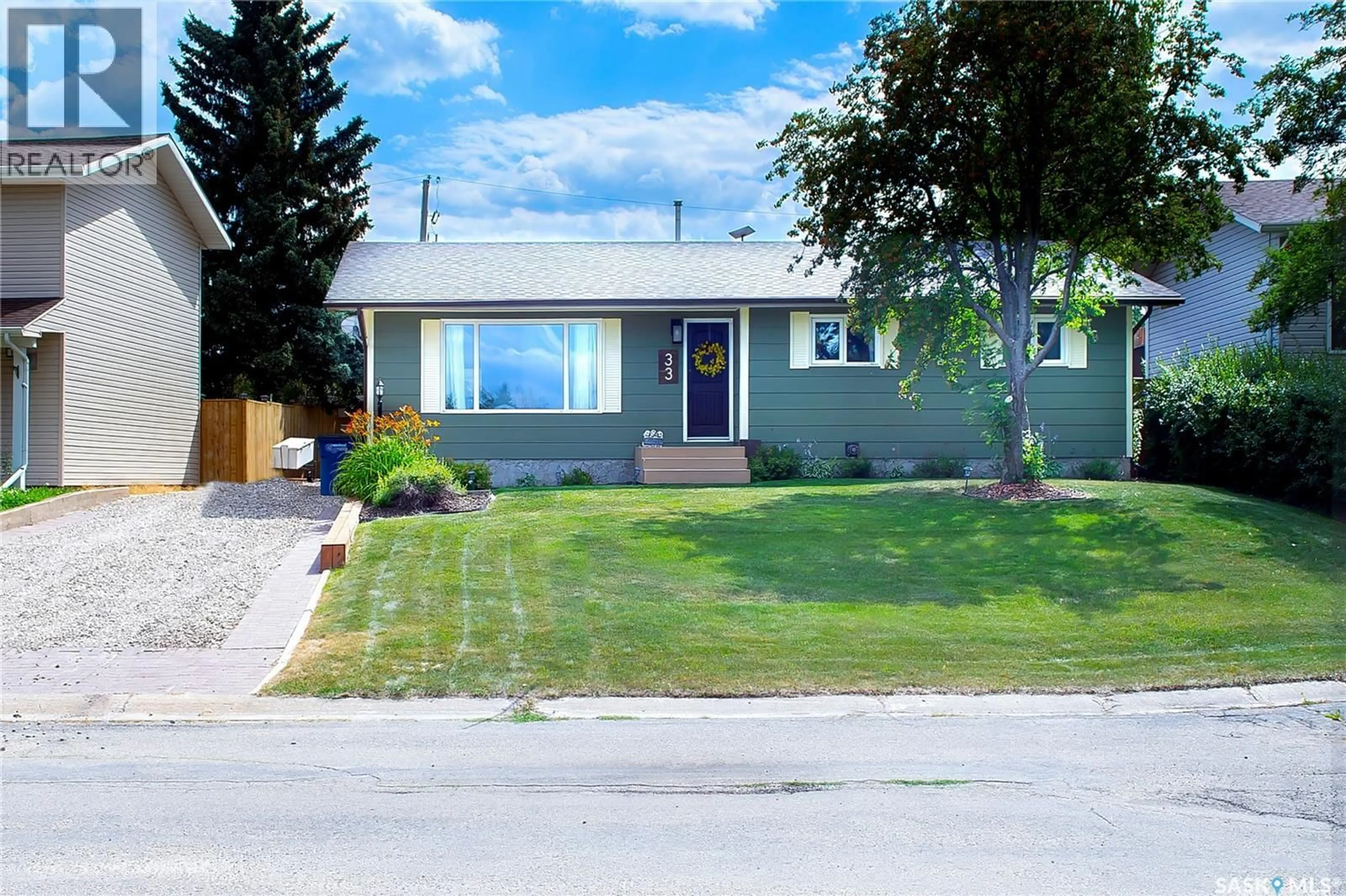 Home with vinyl exterior material, street for 33 BIRCH DRIVE, Birch Hills Saskatchewan S0J0G0