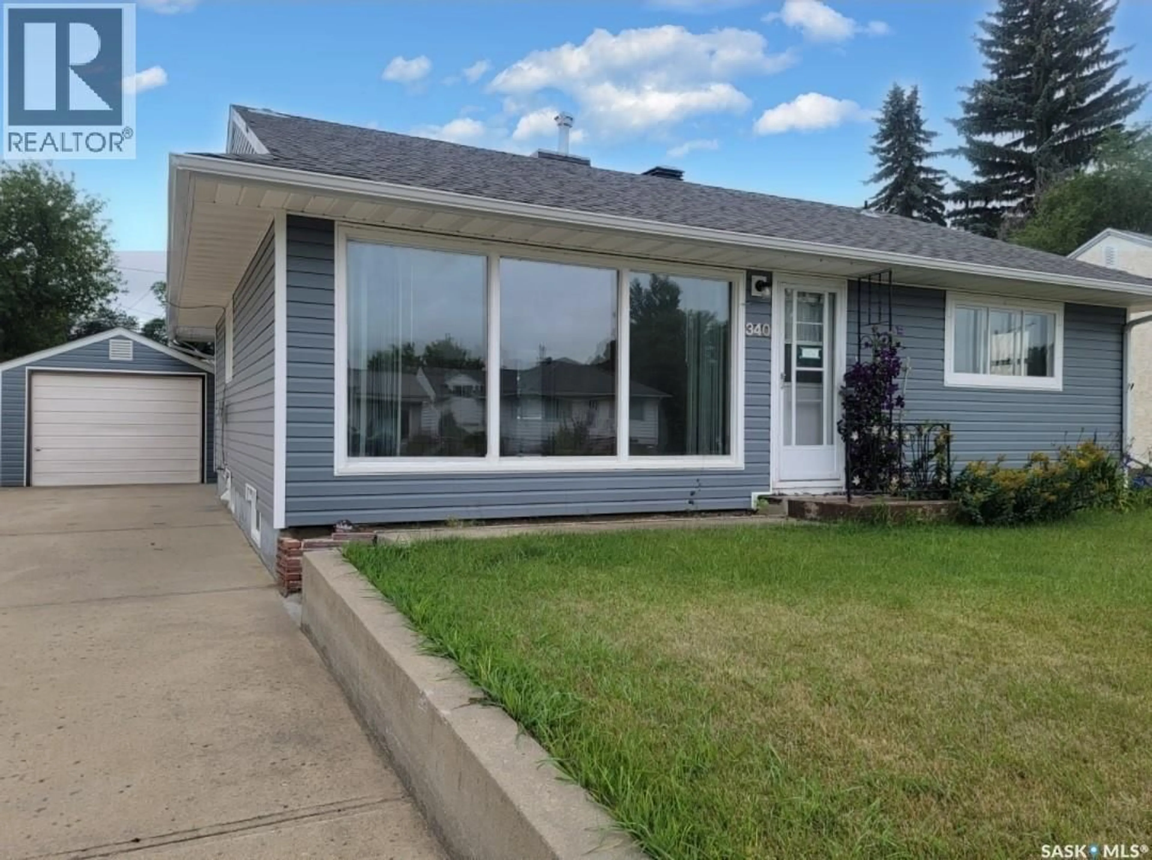 Home with vinyl exterior material, street for 340 3RD AVENUE, Unity Saskatchewan S0K4L0