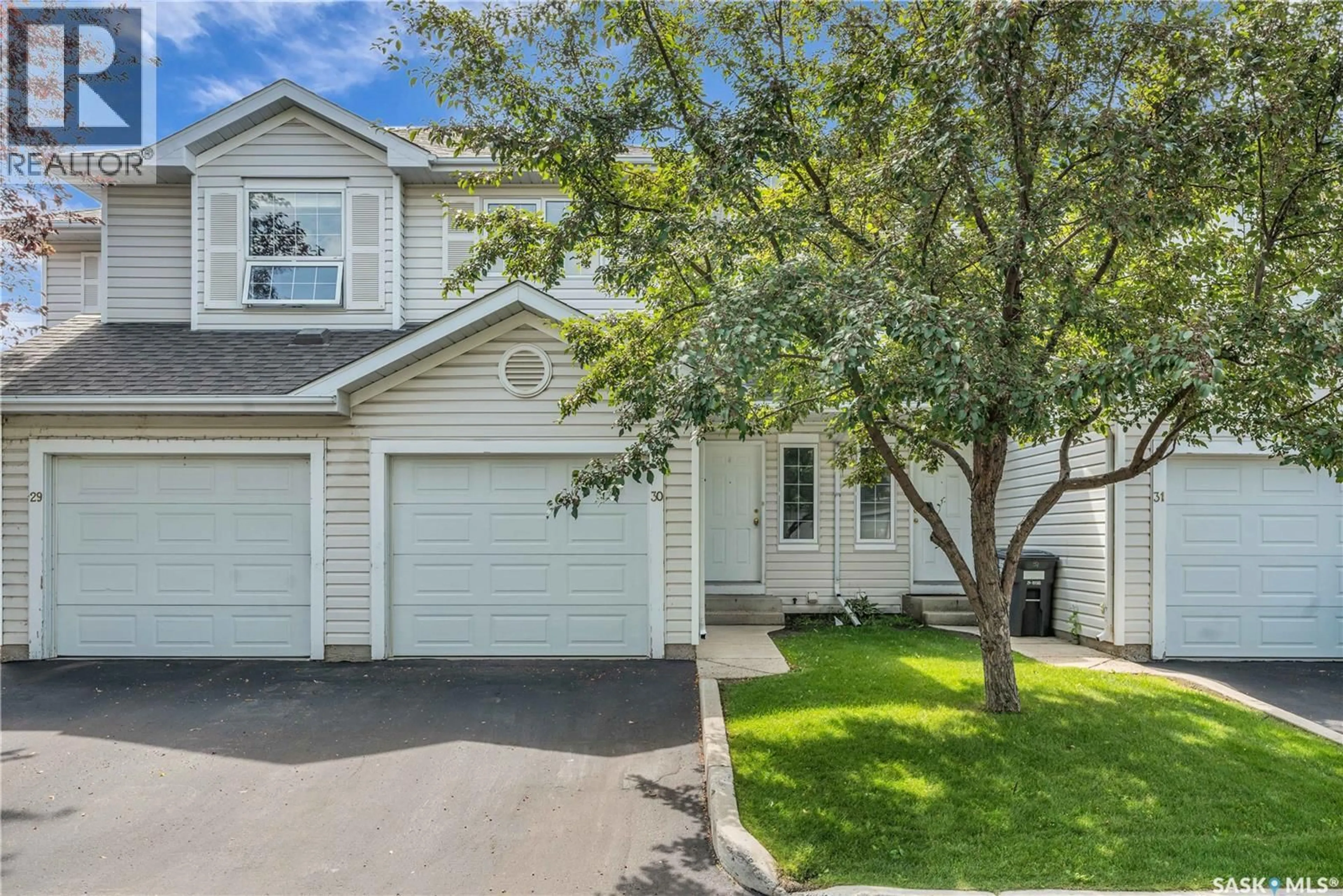 Home with vinyl exterior material, street for 30 - 410 KEEVIL CRESCENT, Saskatoon Saskatchewan S7N4R6