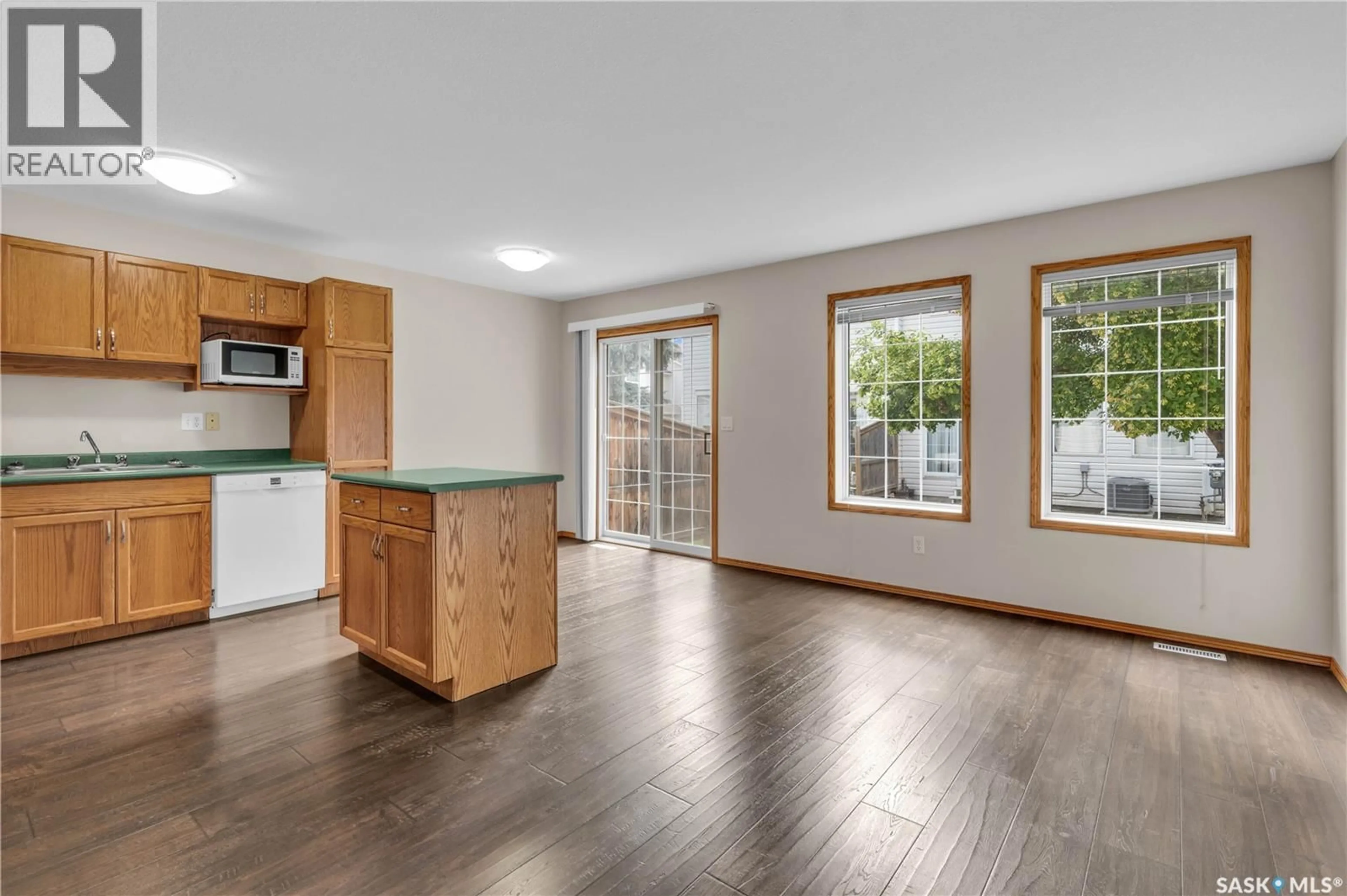 Open concept kitchen, wood/laminate floor for 30 - 410 KEEVIL CRESCENT, Saskatoon Saskatchewan S7N4R6