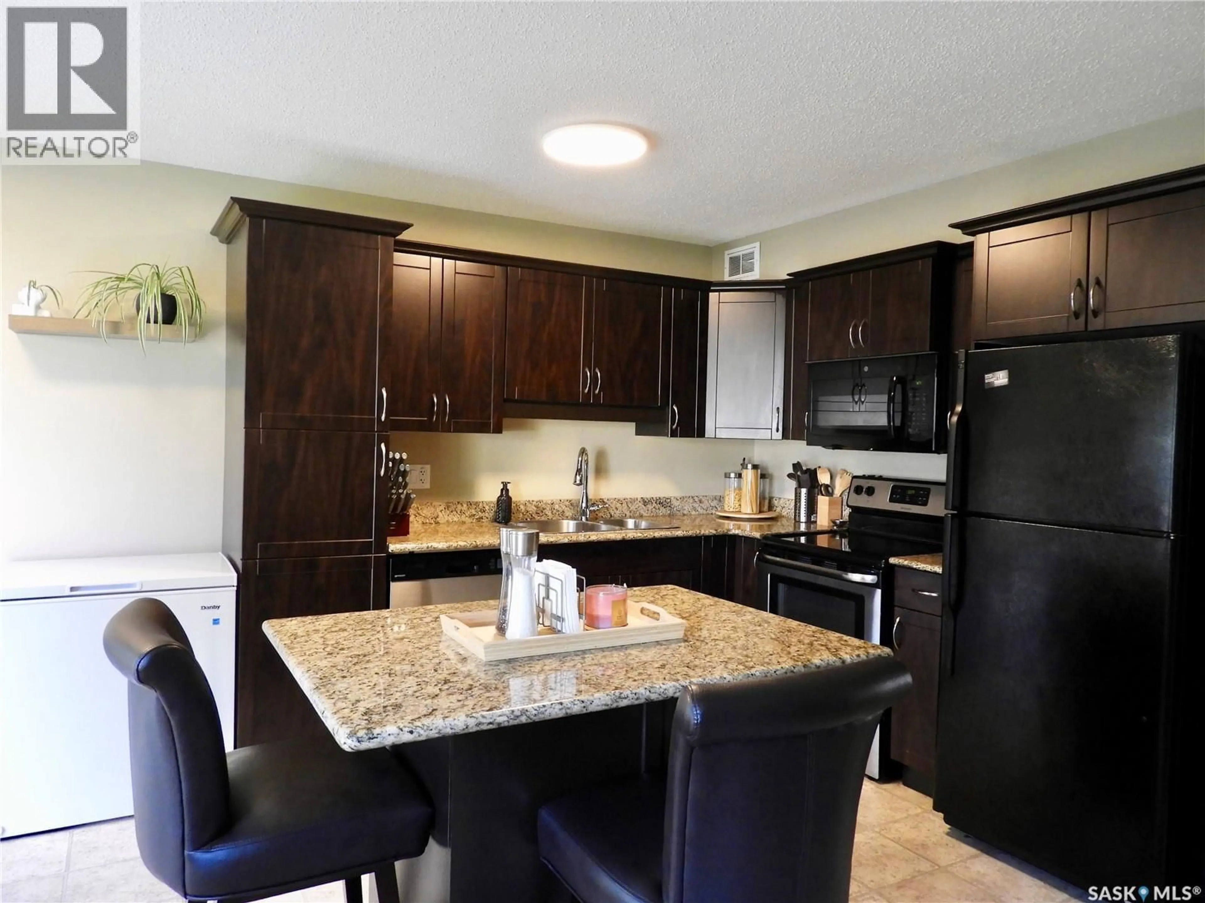 Open concept kitchen, unknown for 105 - 211 LYND CRESCENT, Saskatoon Saskatchewan S7T0C3