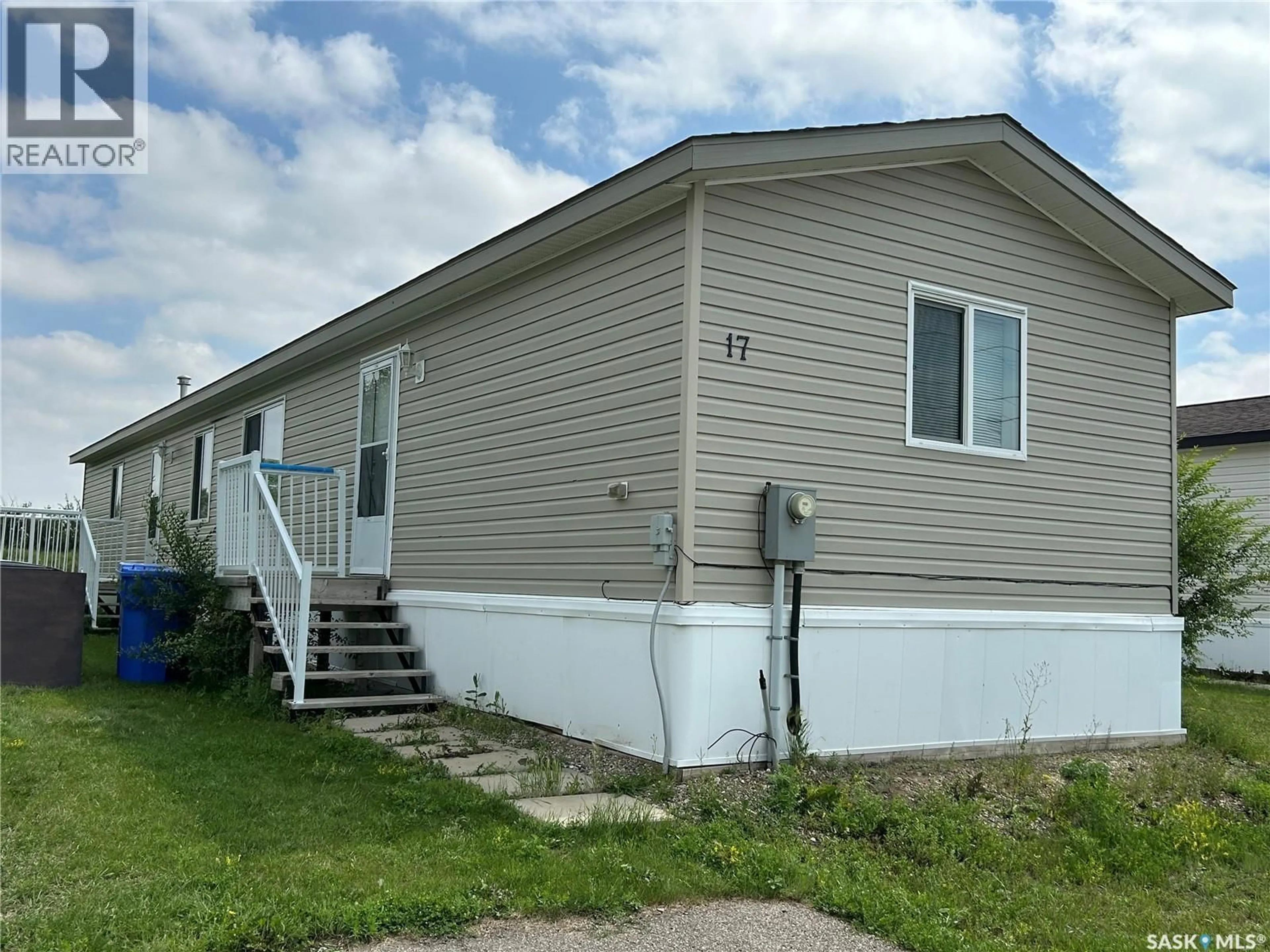 Home with vinyl exterior material, street for 17 2004 ALICE ROAD, Estevan Saskatchewan S4A3A7