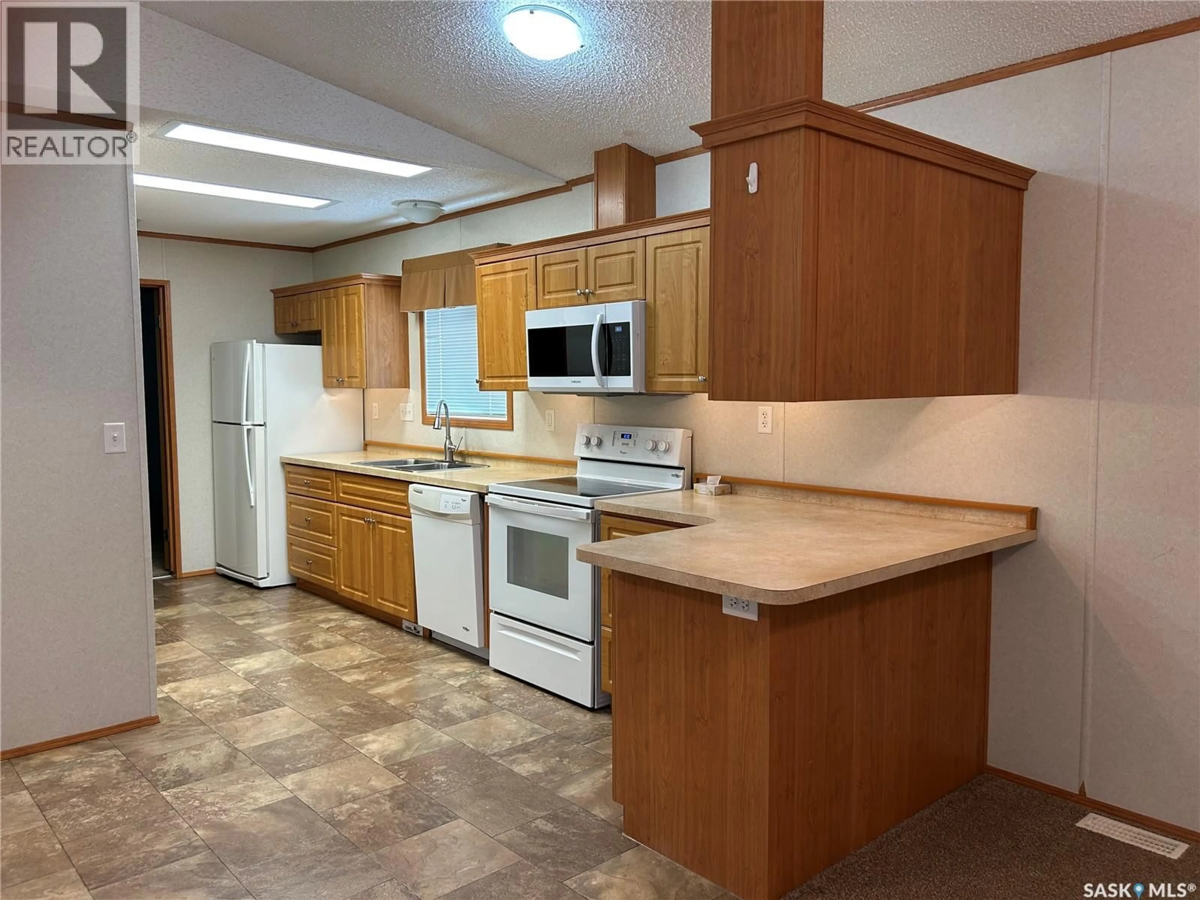 Standard kitchen, ceramic/tile floor for 17 2004 ALICE ROAD, Estevan Saskatchewan S4A3A7